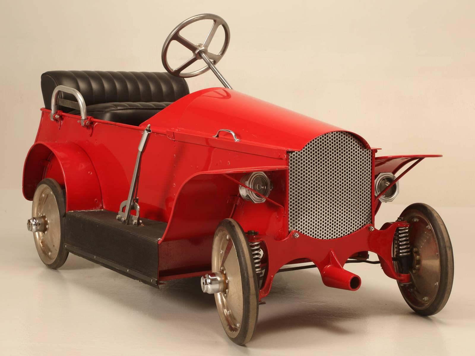Certainly, the most unusual Child’s Battery Powdered Electric Car I have ever seen. As the story was told to me back in the 1970’s, it was actually produced for the owner of an amusement park, who had a difficult time walking his extensive grounds.