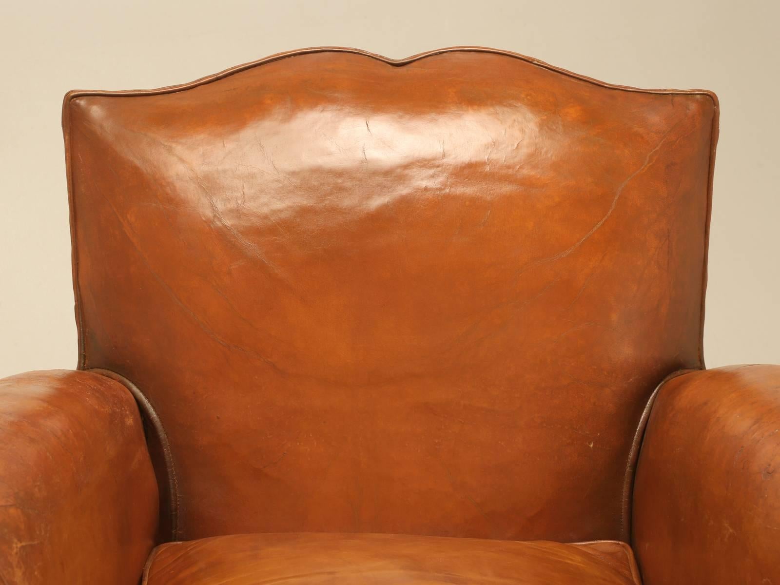 French Art Deco Moustache Back Leather Club Chairs with one ottoman  In Good Condition In Chicago, IL