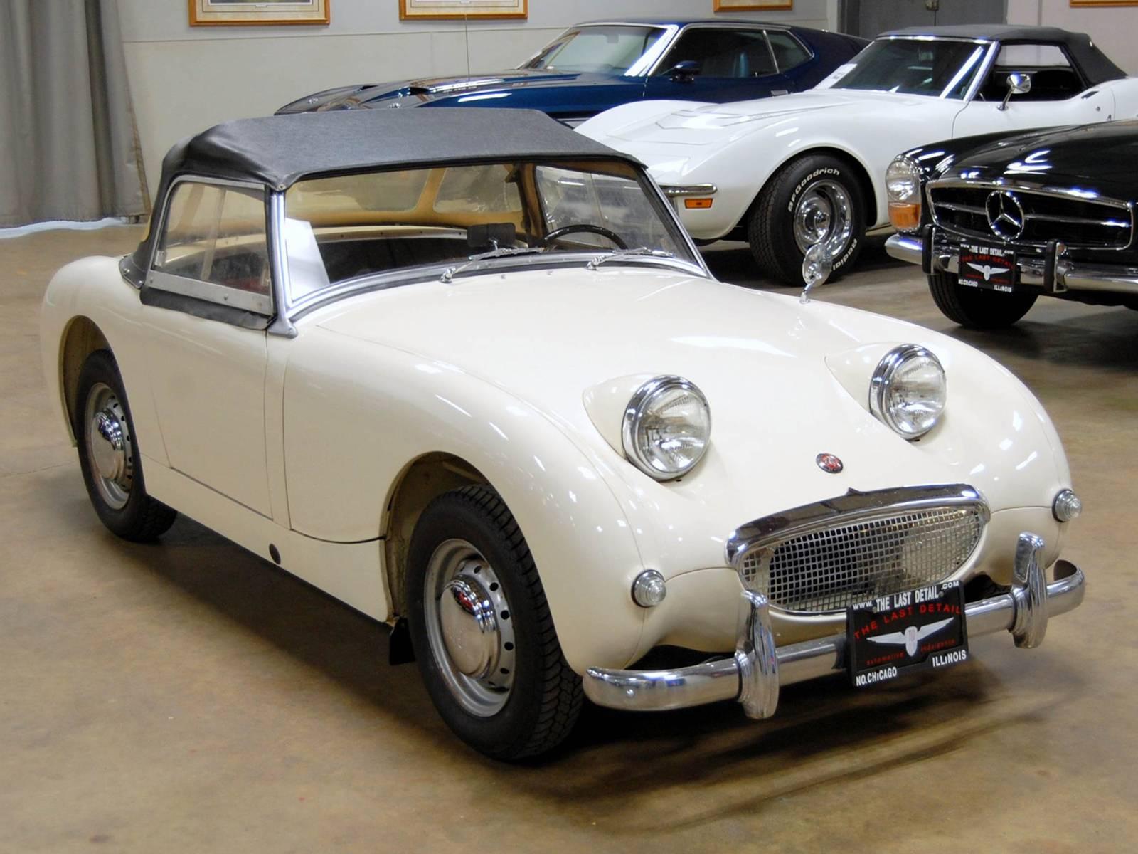 1959 Austin Healey Bug-Eye Sprite in OEW (old English white) over red upholstery with 19,398 “real” miles from new.
“Complete original Survivor,” and that can sometimes be a misnomer, because the question always is; how well did it survive and in