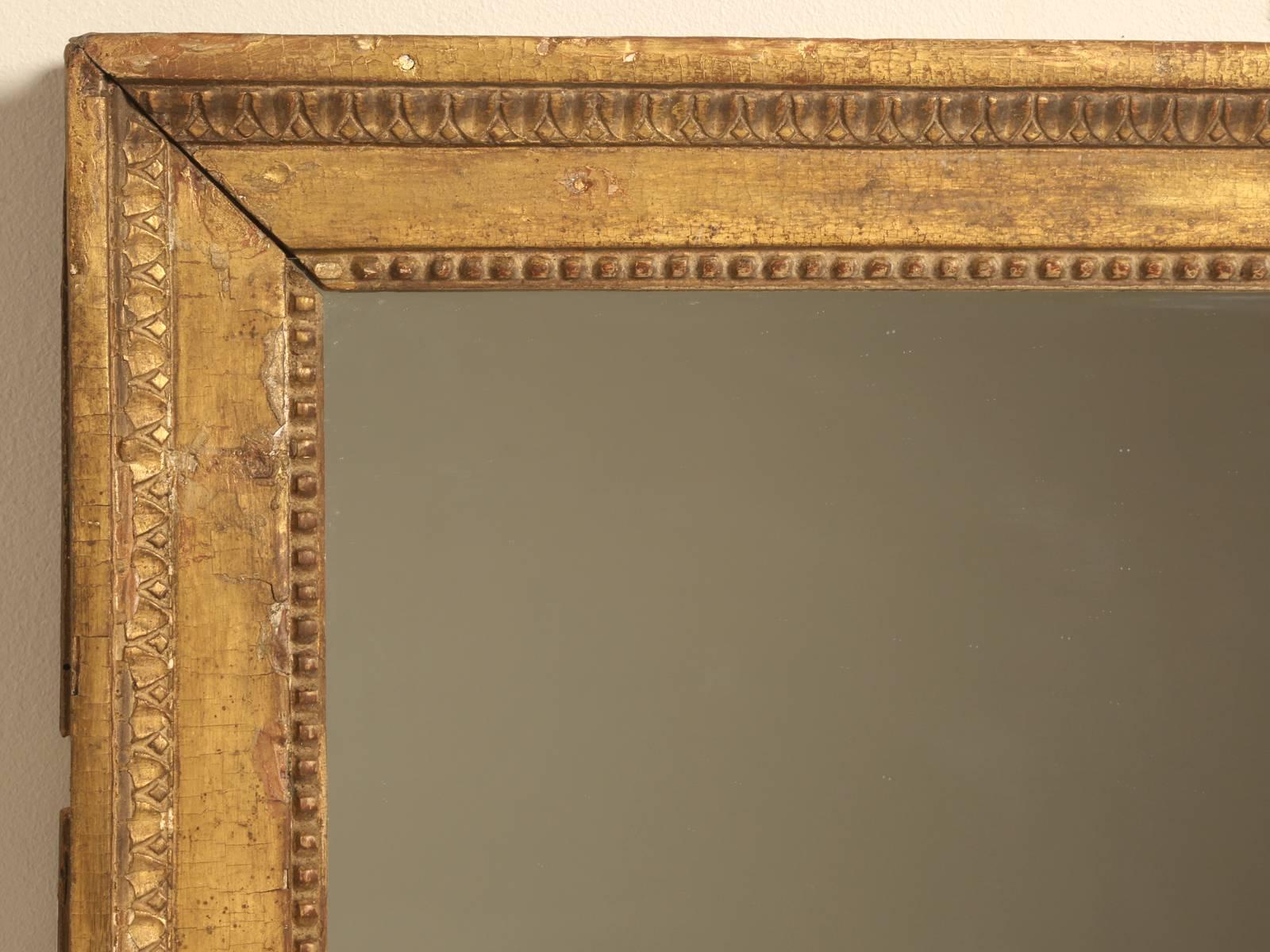 Described by the expert in France as; “Grand mirror in wood, doré, époque Louis XVI”. We found this beautiful, unrestored Louis XVI mirror in the town of Lyon, famous for its incredible restaurants and beauty. The glass portion of this Louis XVI