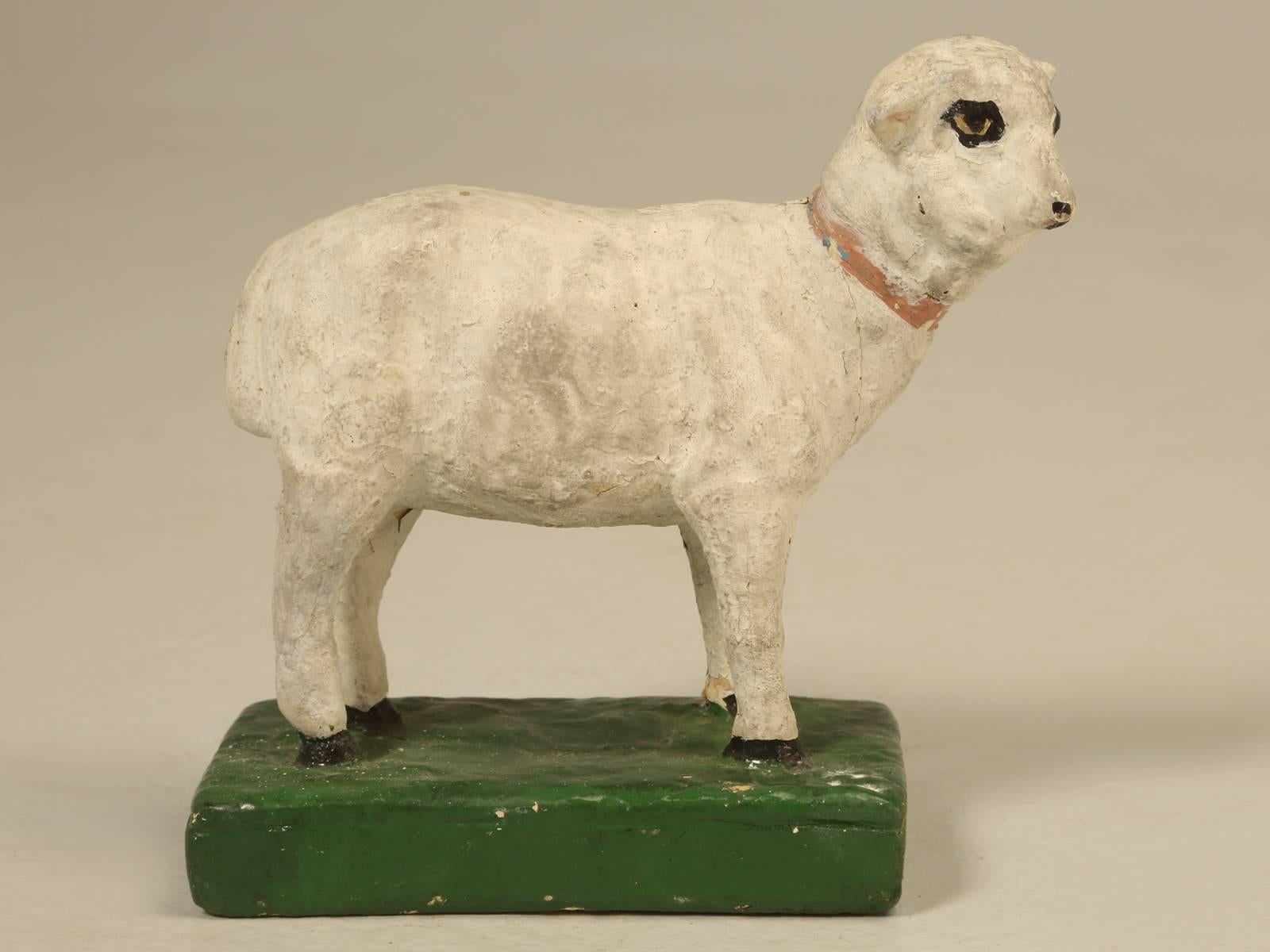 Vintage American chalkware of a sheep in an unrestored condition. Chalkware is an American term for figurines made of molded plaster of Paris. Most of the sculptures you see now, were made during the great depression. They have a bit of English