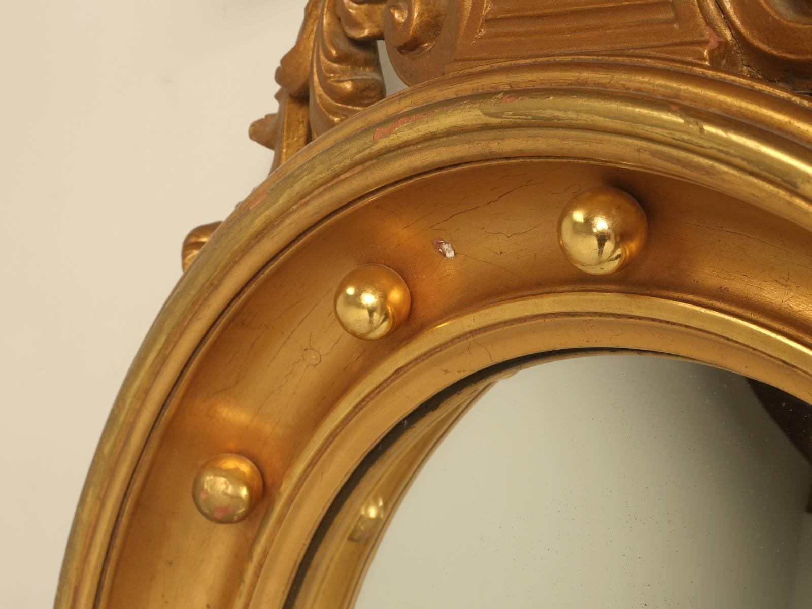 Mid-20th Century Regency Eagle Convex Mirror with a Gold Leaf Finish