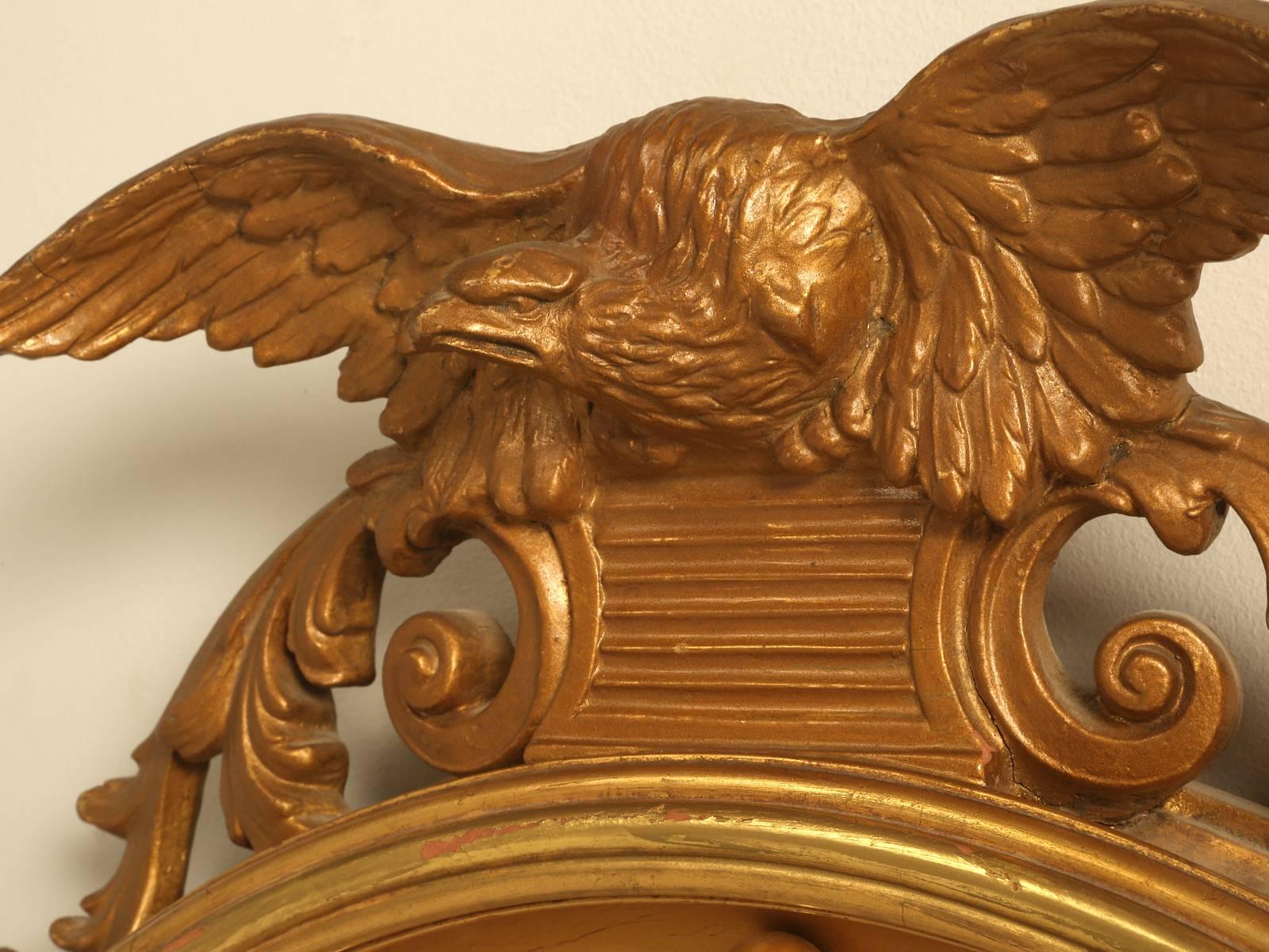 Regency Eagle Convex Mirror with a Gold Leaf Finish In Good Condition In Chicago, IL