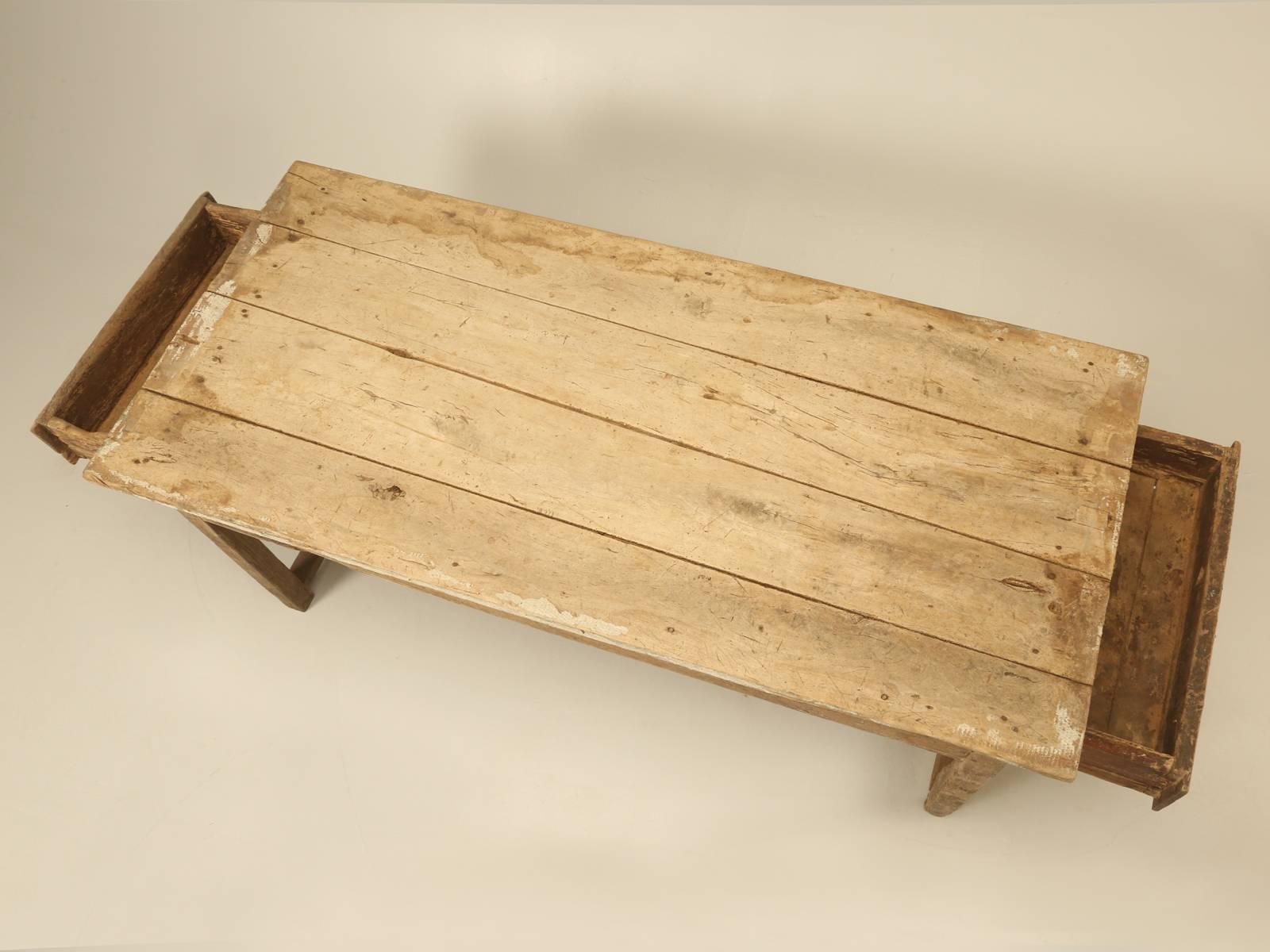 This antique Country French farmhouse dining table, really defines the definition of a barn find, but in this case, we are not thinking of an antique automobile, but rather a 300-year-old French dining table. Our Old Plank restoration department,