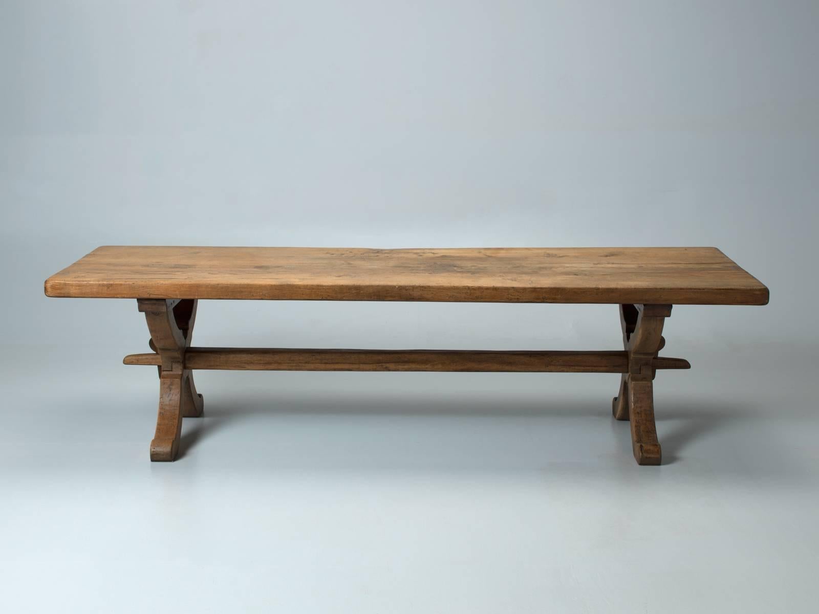 Antique French solid white oak dining table, that has somehow mysteriously escaped the common downfall of any prior restoration attempt. To find a 100-year-old authentic French farm table, that no one has placed their grimy hands on and ruined the