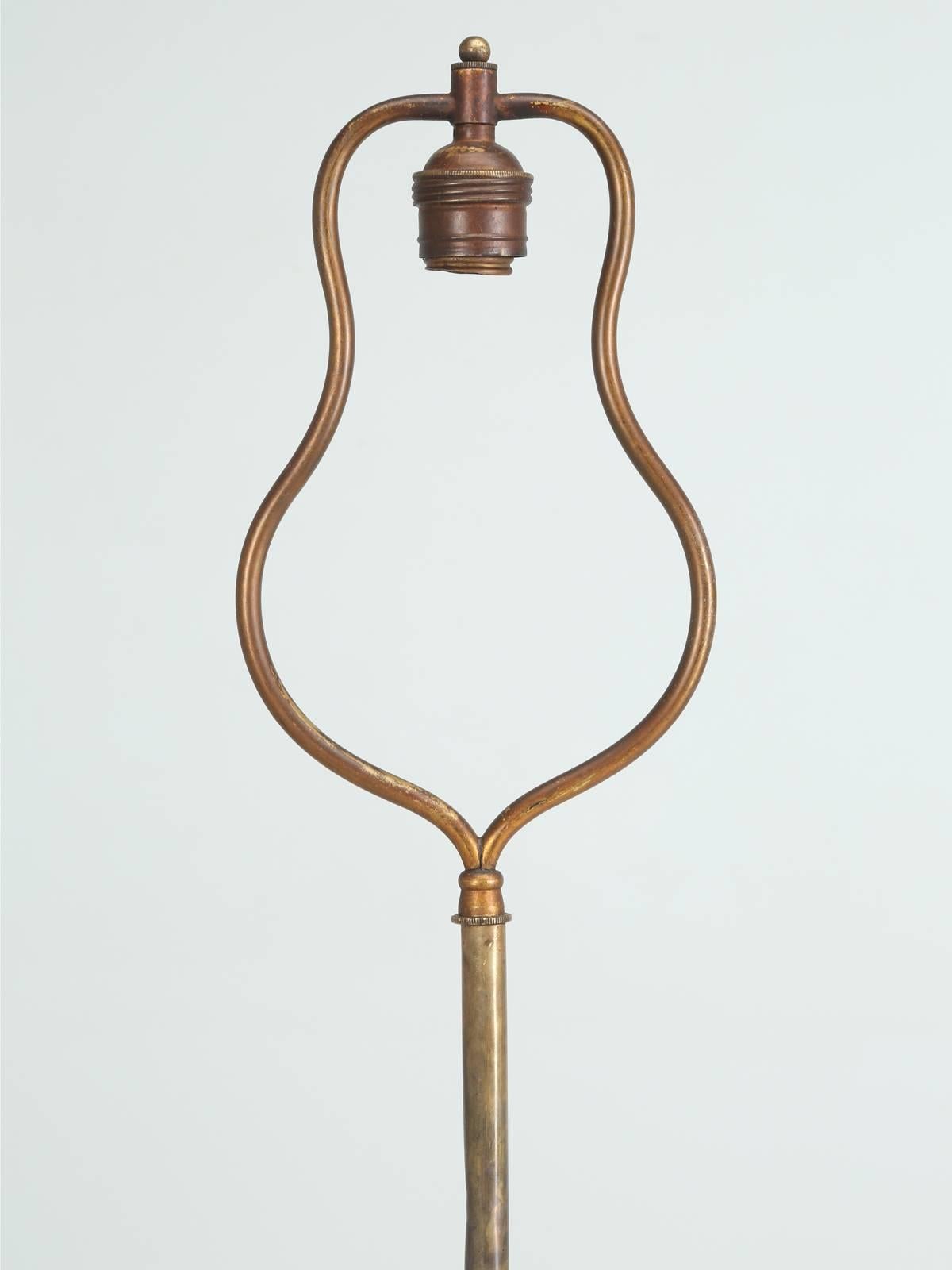 Interesting antique floor lamp, made from an English, circa 1918 Lee-Enfield Rifle, marked SMLE “Long Lees” configuration, or more commonly called a MKIII, built by BSA, who were the same folks who manufactured the famous BSA Motorcycle. We just