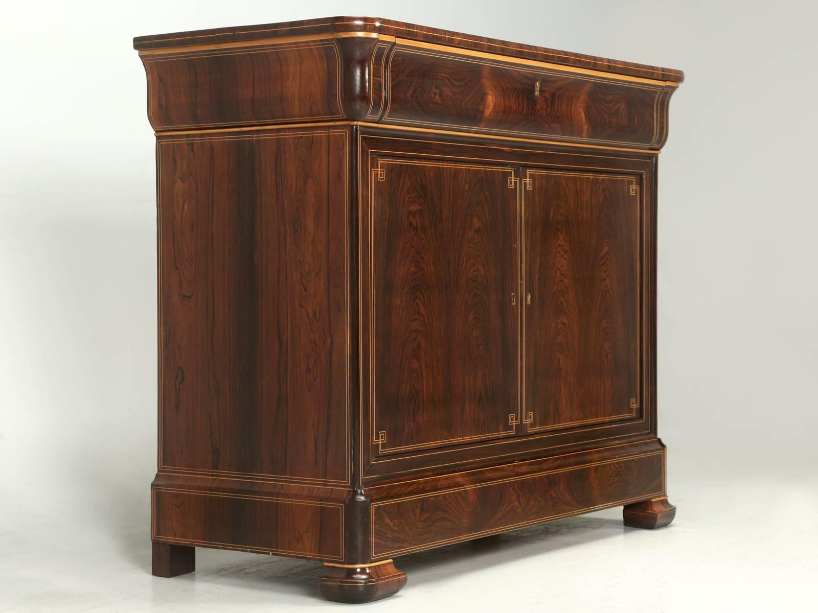 Antique French Commode or Buffet, made from one of the rarest woods, palisander, or more commonly referred to as, Madagascar Rosewood. Not only is this one of the world’s most beautiful species of woods, but the quality of construction, is
