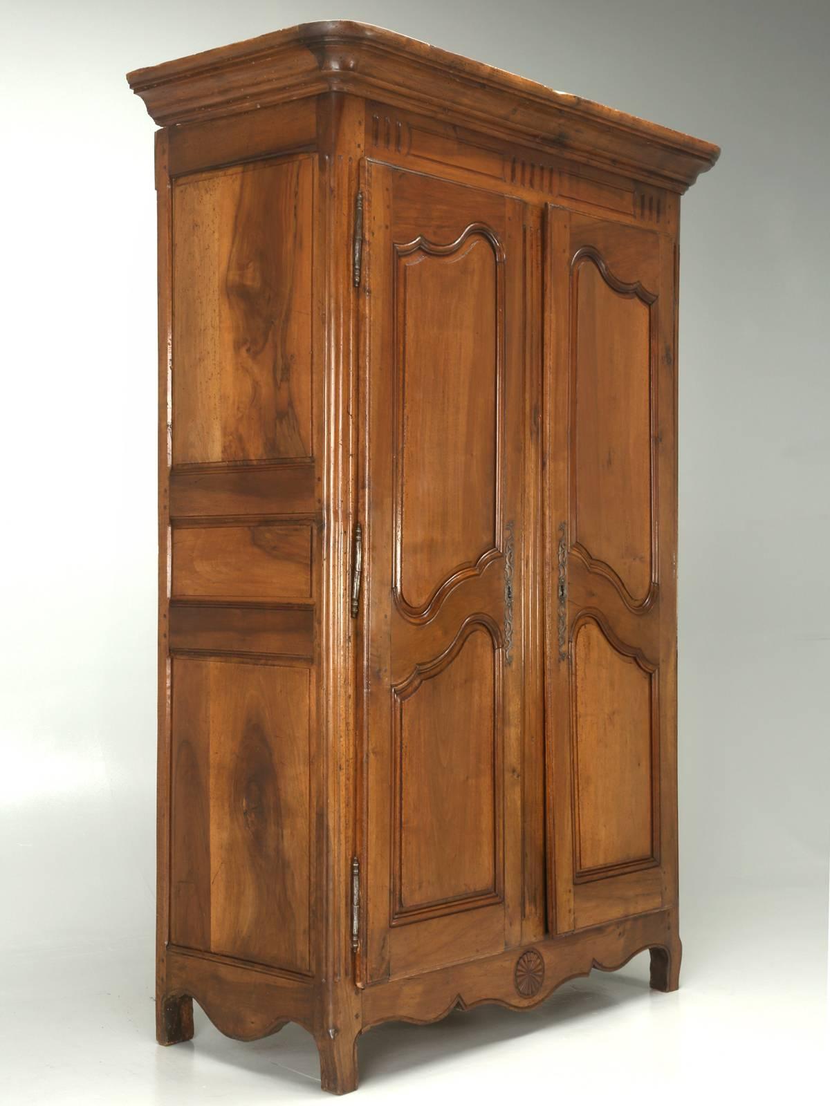 Antique French 18th century solid Walnut Armoire. We located this Antique French Armoire in the Toulouse region of France and really, only had to spend a few days in our Old Plank workshop, before offering the French Armoire for sale. We went