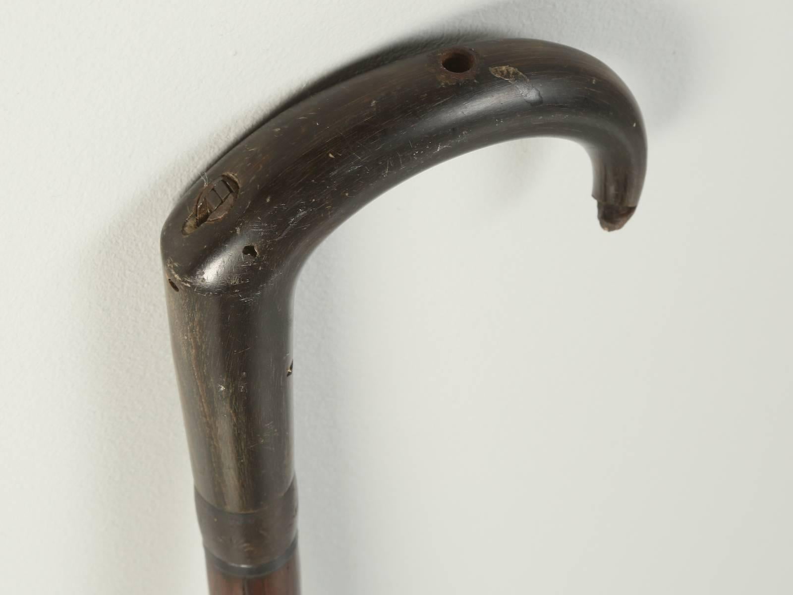 This cane or walking stick originally appears to have been a gun and although many of the pieces are missing, I am sure some gunsmith could restore it. This was found near Toulouse. The handle I believe was carved from horn and the wood is