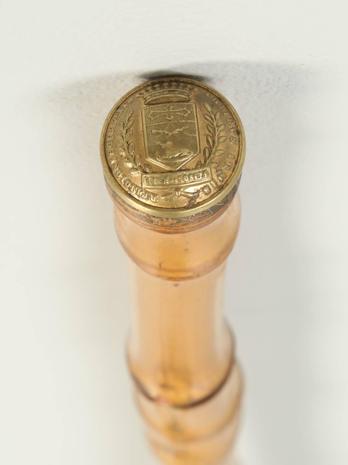 Antique French bamboo walking stick, or cane that houses a hidden sword. The steel sword is stamped Erardi EBE and the brass cap says; School of Soreze. The condition is actually quite nice and all we did was to apply a clear-coat of imported