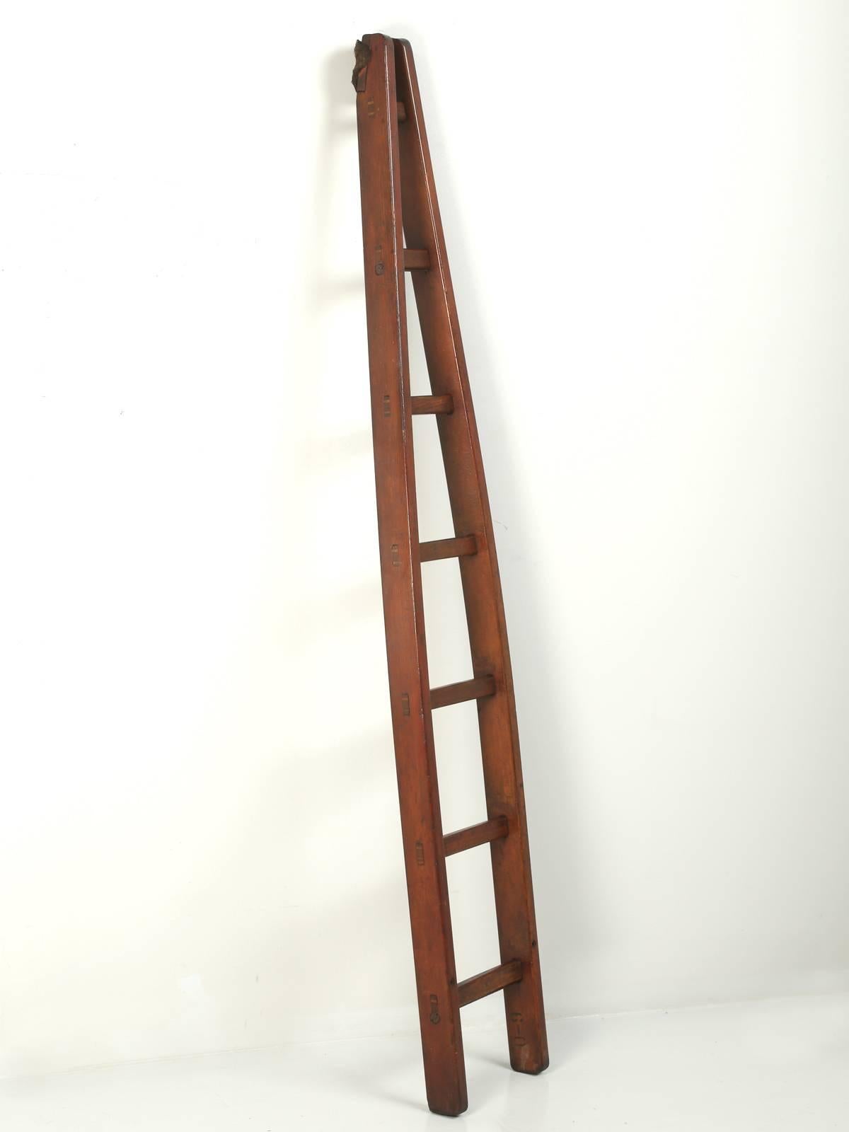 One of the 1stdibs viewers was kind enough to enlighten (pun intended) us, as to what this ladder was used for; “This is a 