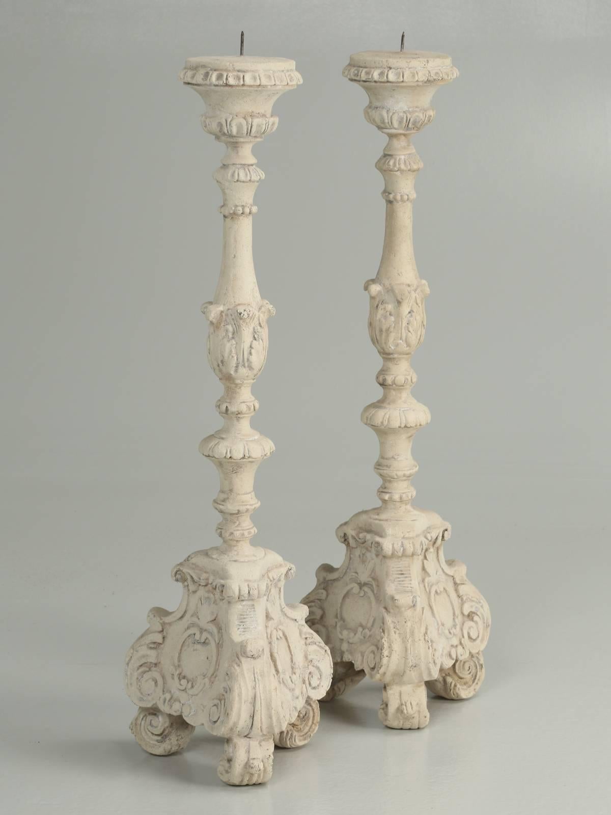 Reproduction pair of faux painted French or Italian style wooden candleholders.

         