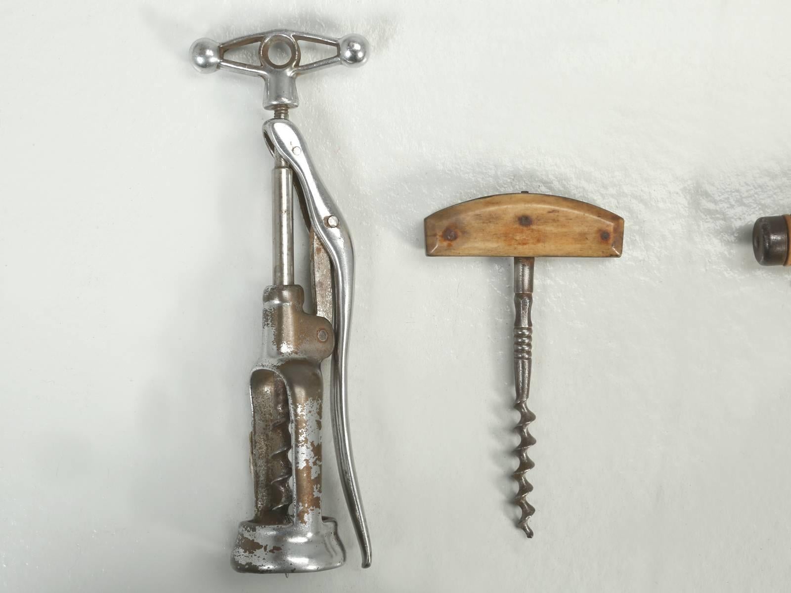 Very nice collection of (12) vintage and antique French corkscrews. They would wonderful in a shadow box, mounted on the wall of a wine room.
Measurements provided are for the corkscrew on the bottom right.