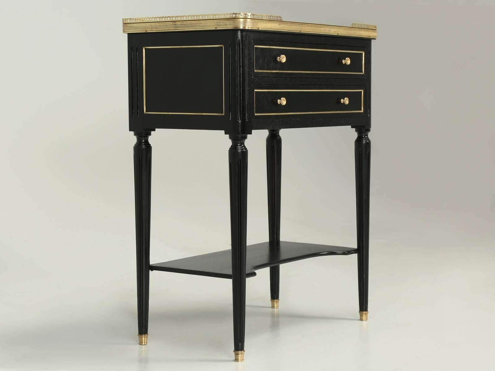 Antique French Louis XVI Style End, or Side table, or could even be used as a night stand. Our Old Plank finishing department, hand-scraped off the old worn lacquer and applied an ebonized finish, that still allows for the grain of the mahogany to