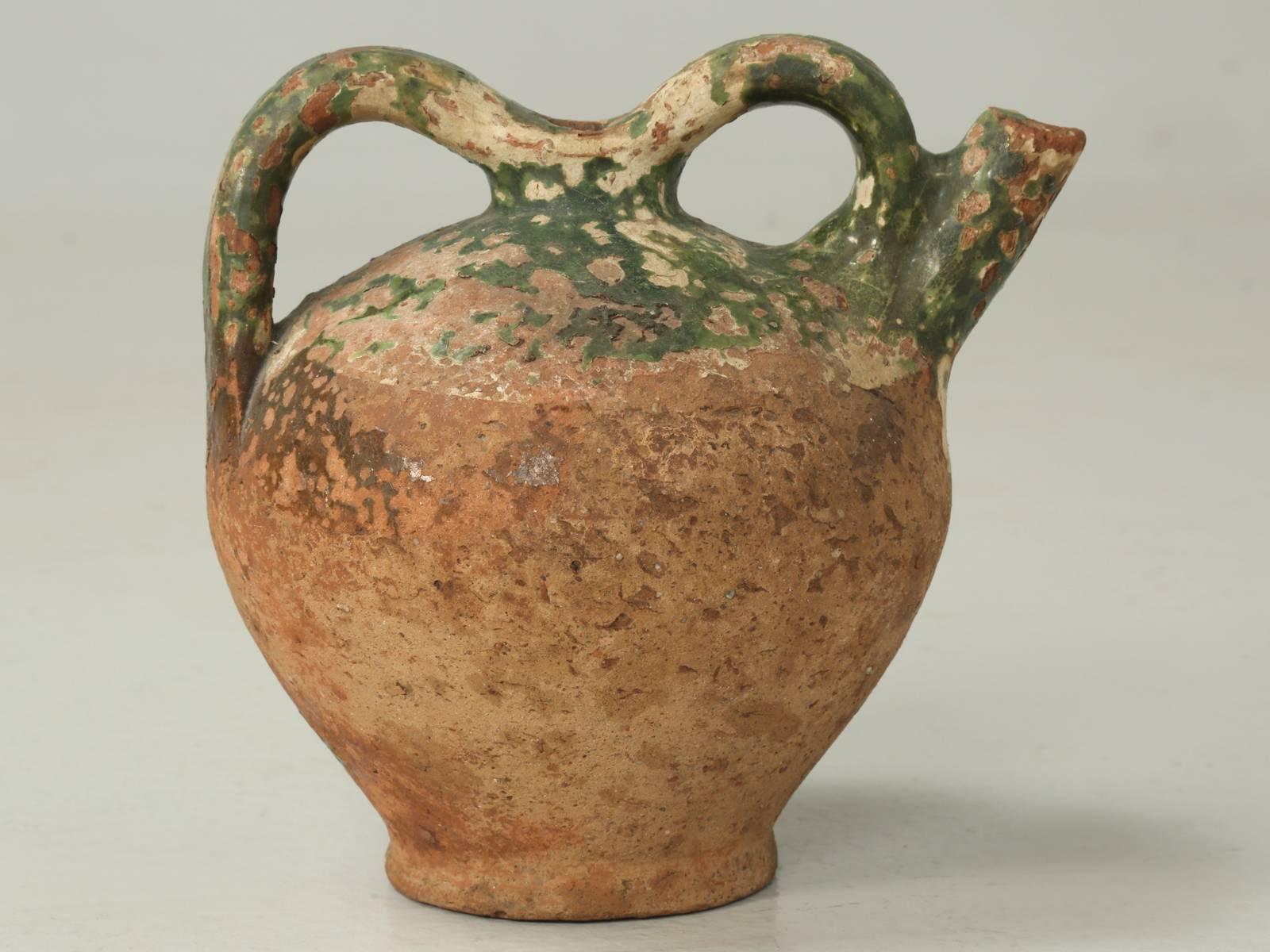 Some people will look at this piece of antique French pottery as a jug, with a very distressed green glaze, but I see it as a piece of sculpture. The design of the pottery’s handle is exquisite and almost give it a bit of a modern flare. Great