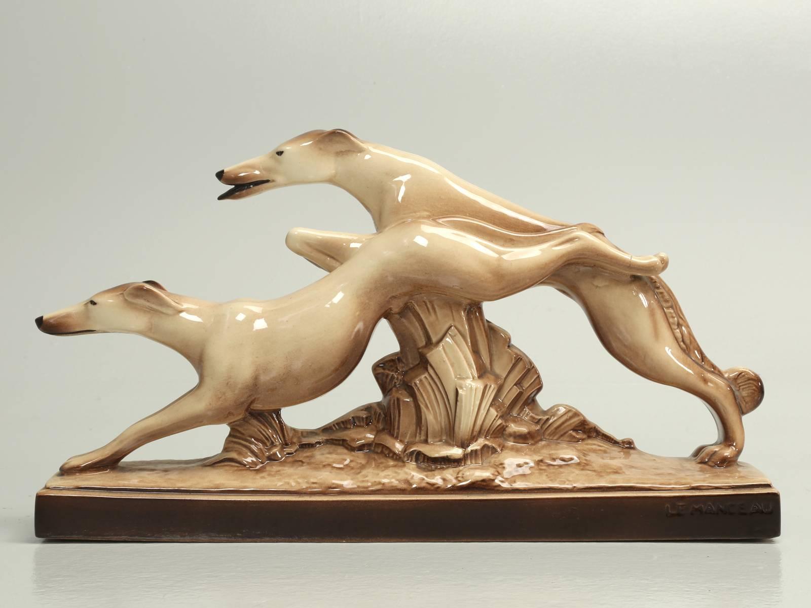 Found in Toulouse, France is this Whippets in motion and looks to be made in the 1950s.
Signed. Repair at the back legs. Some chips at the base.