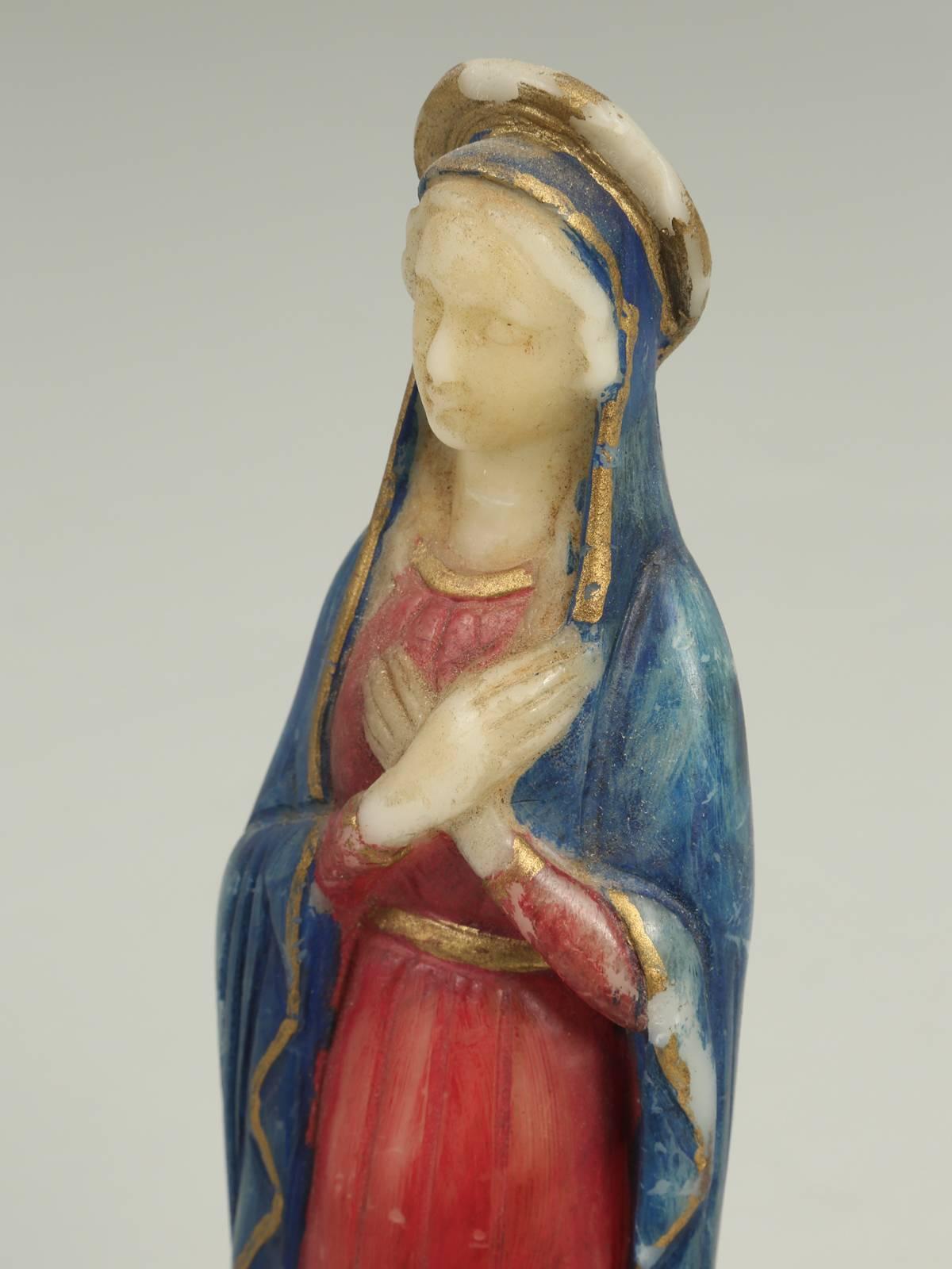 This is a wax carving of Mary, probably done before WWII and is actually signed. The signature is Vernez and could have been a model for a future casting.
Signed.