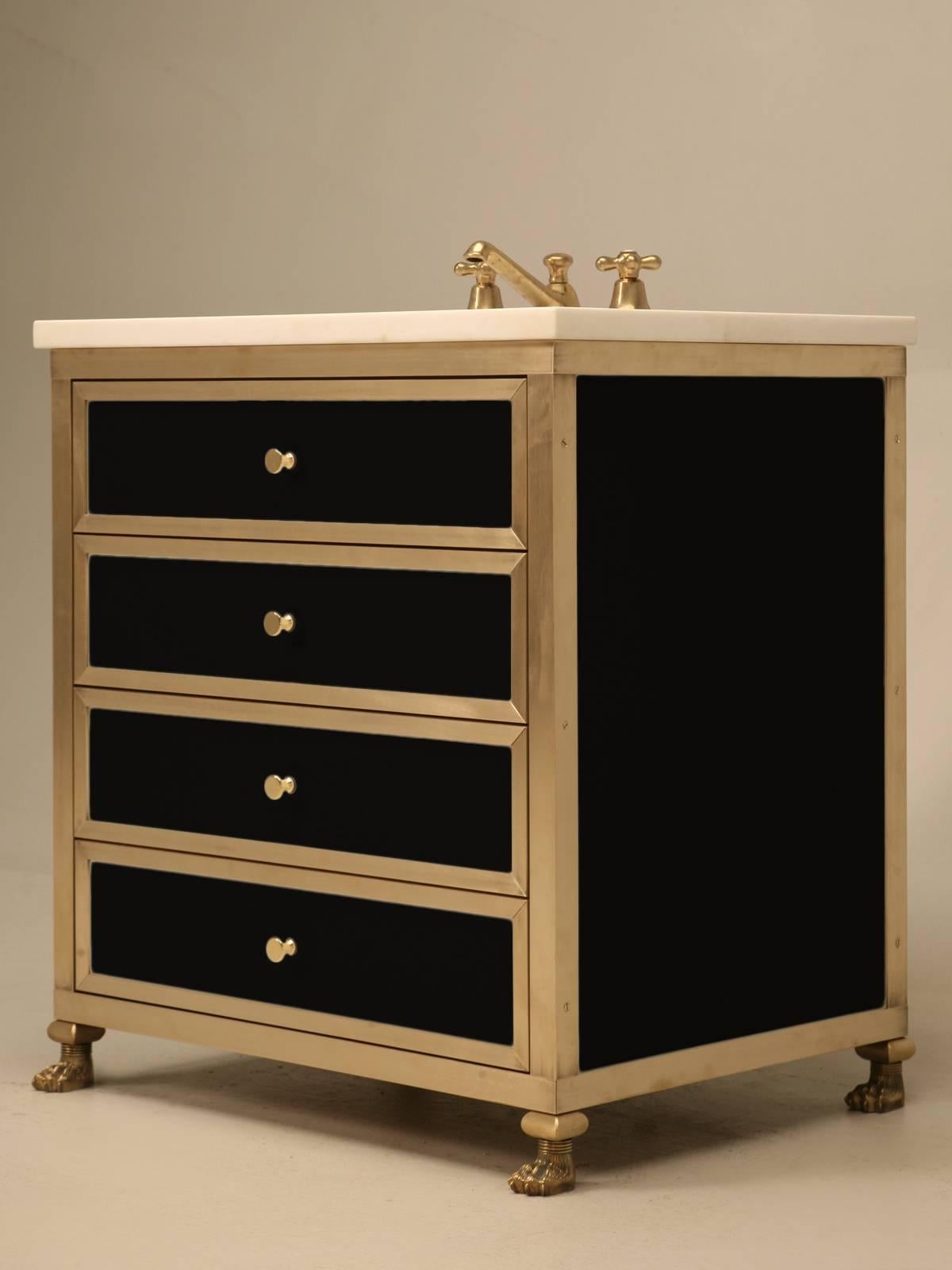 An Old Plank original, solid bronze bathroom vanity with endless choices available for the colored inserts. The vanity pictured here, was made with black glass inserts, or could as easily be produced with vitreous enamel (think kitchen stove, same