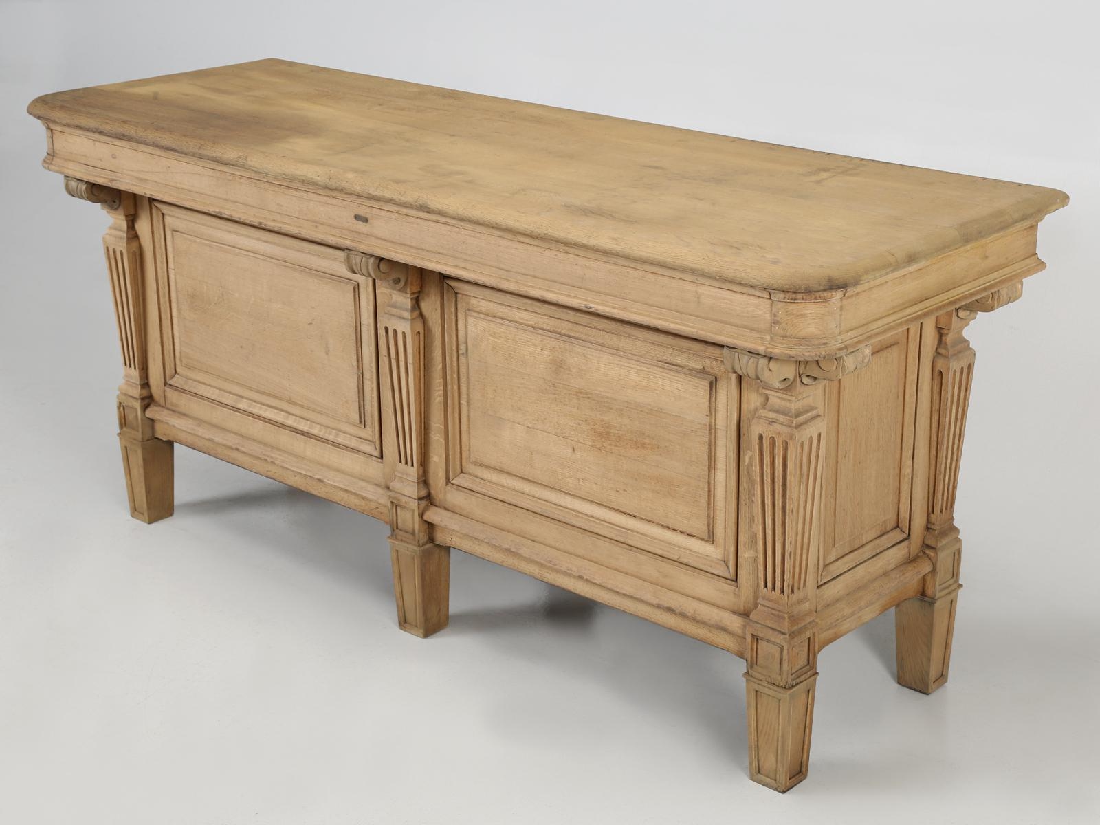 This antique French store fixture from the early 1900s, would make absolutely the most perfect kitchen island, from both an aesthetic and functional point of view. We carefully rebuilt the entire structure, while not disturbing the natural wear and