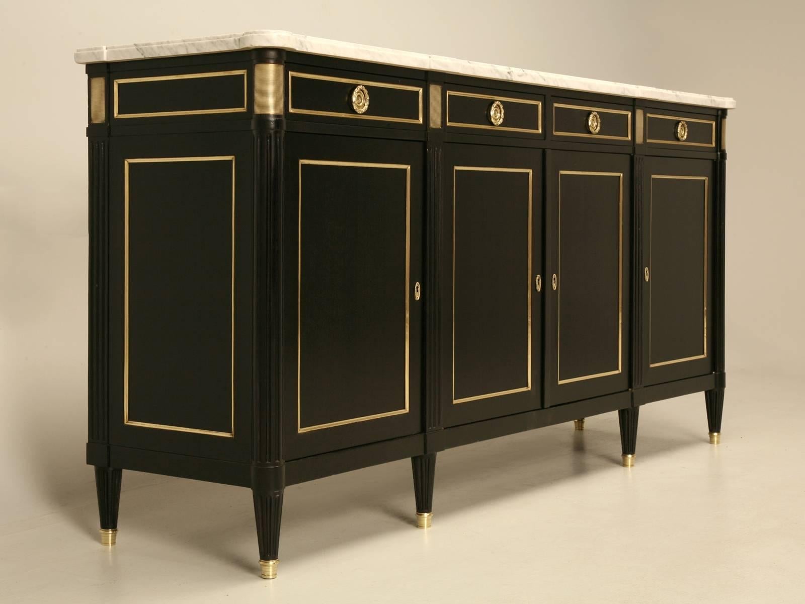 Maison Jansen inspired French Louis XVI buffet that our craftsmen restored to a very high standard, in a traditional ebonized finish which still allows for the grain of the mahogany to show through. This is not one of those typical quickie black