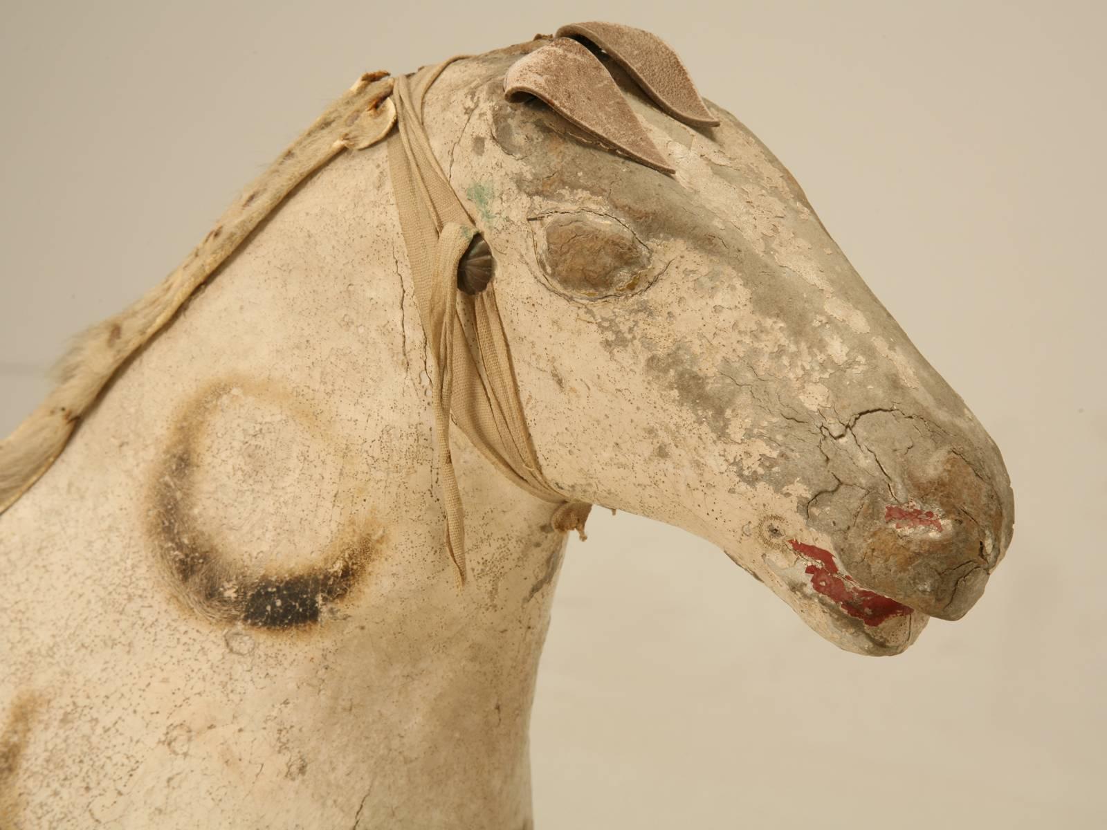 Antique Child’s Horse made from Papier Mâché draped over a Wooden Frame and purchased in America about 40 years ago. Makes for a great design accessory for a kid’s bedroom or?.