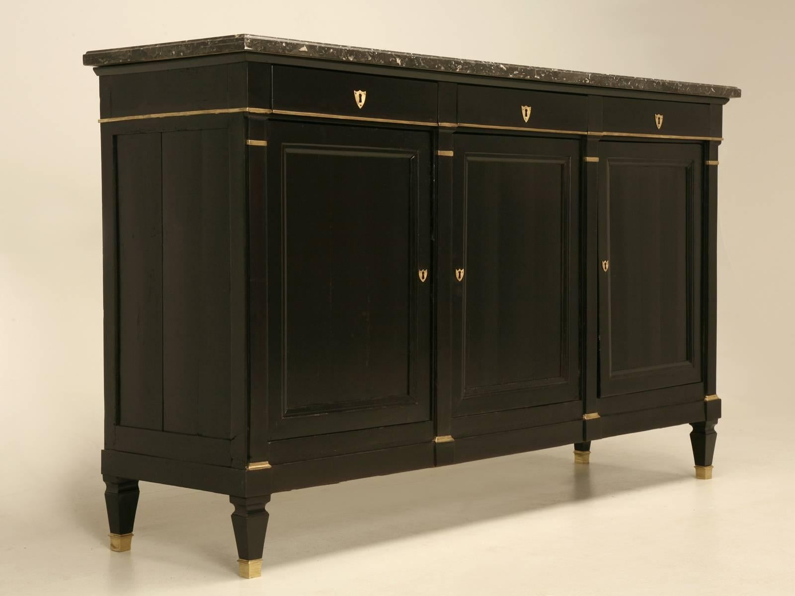 Jansen inspired French Directoire style buffet with a beautiful grey marble top. Thoroughly restored in house by our expert craftsmen to a very high standard. Each buffet enters into our workshop to have the carcass inspected for any weak spots, or