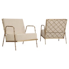 Gilded Metal Faux Bamboo Upholstered Lounge Chairs in the Maison Jansen Style.