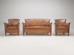 Vintage French Pair of Leather Club Chairs, Matching Settee all Original c1930's