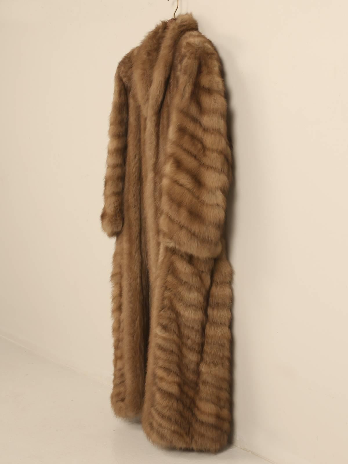 The shoulder width of the Bob Mackie Sable Fur coat is 19