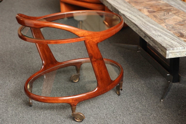 Stylish bar cart designed by Cesare Lacca made in Milan 1950, beautiful form, color and grain, hard model to find.
 