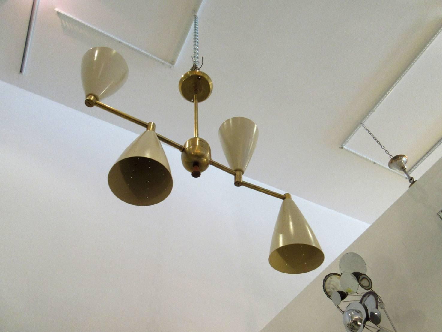 Two Mid-Century Modern Brass and Enamel Articulating Chandeliers In Good Condition In West Palm Beach, FL