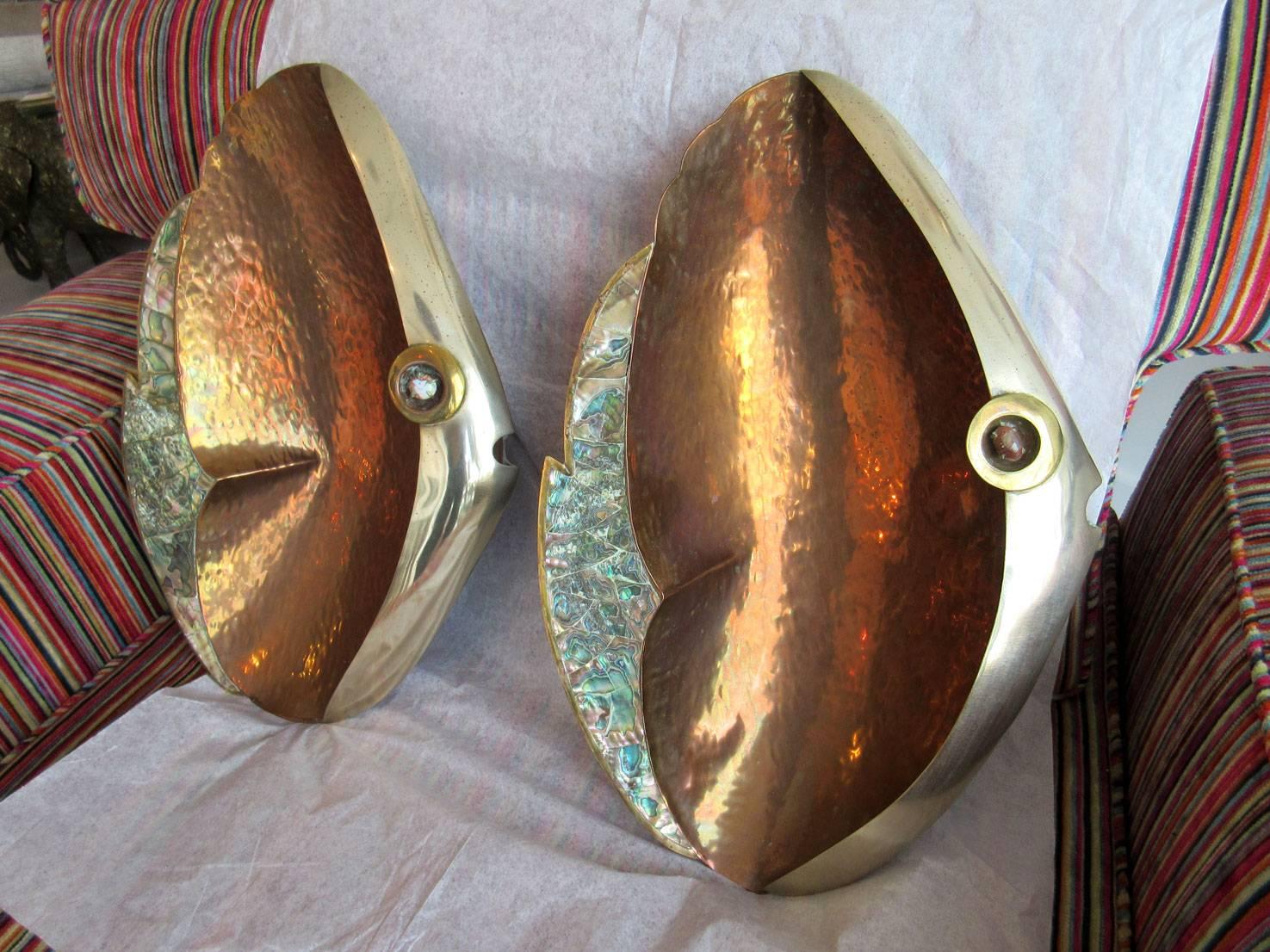 Pair of mixed metal Mexican fish, with abalone inlaid tails and opal stone eyes.
Signed, 