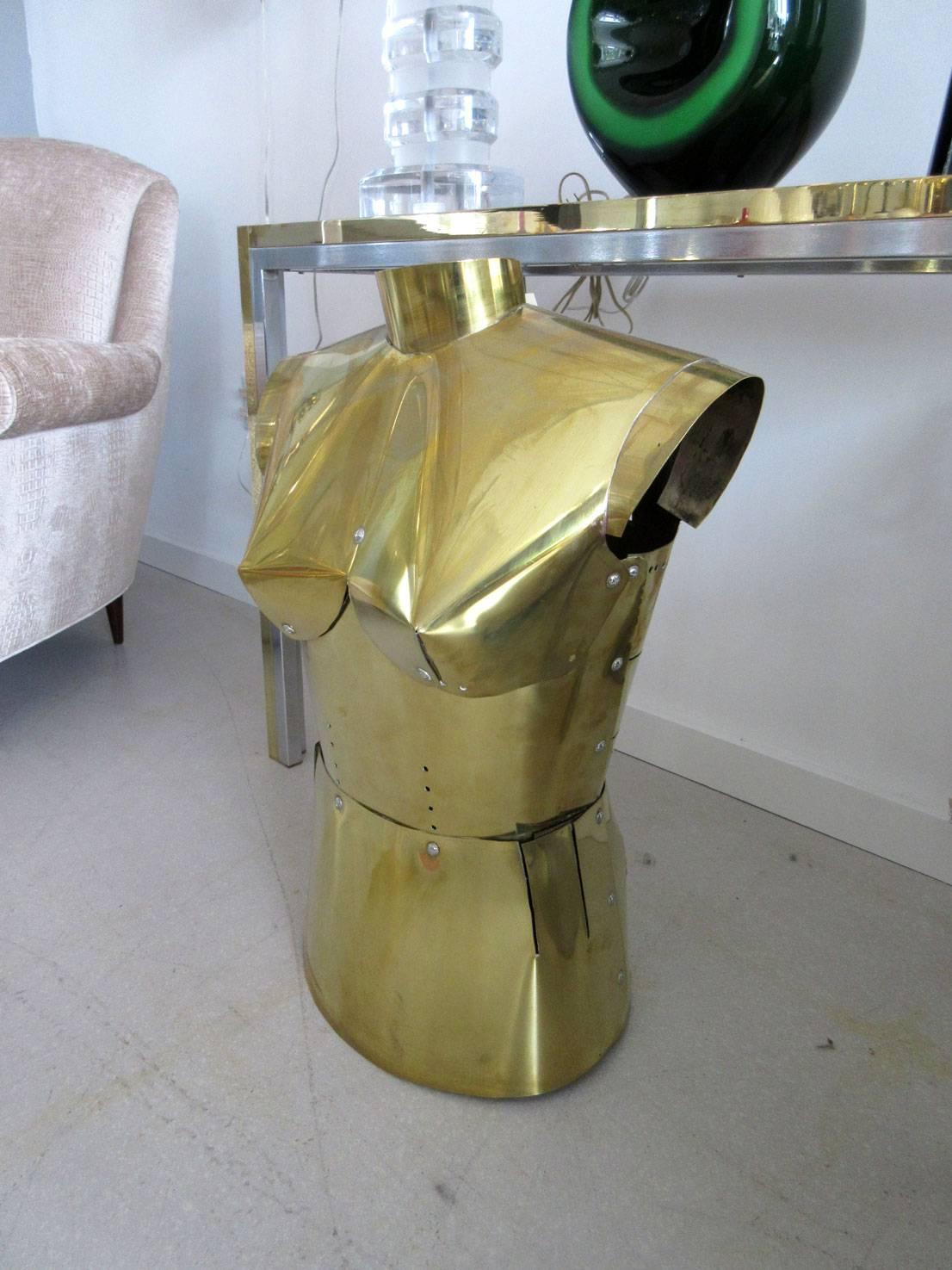 Geometric modern, retro-futurist brass torso, reminiscent of the female android in Fritz Lang's Classic film 'Metropolis.' Clean angular lines. Made in France in the 1960s.