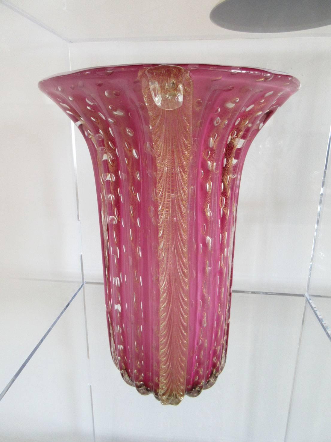 Pair of deep pink Murano art glass vases with controlled bubbles signed by Toso.