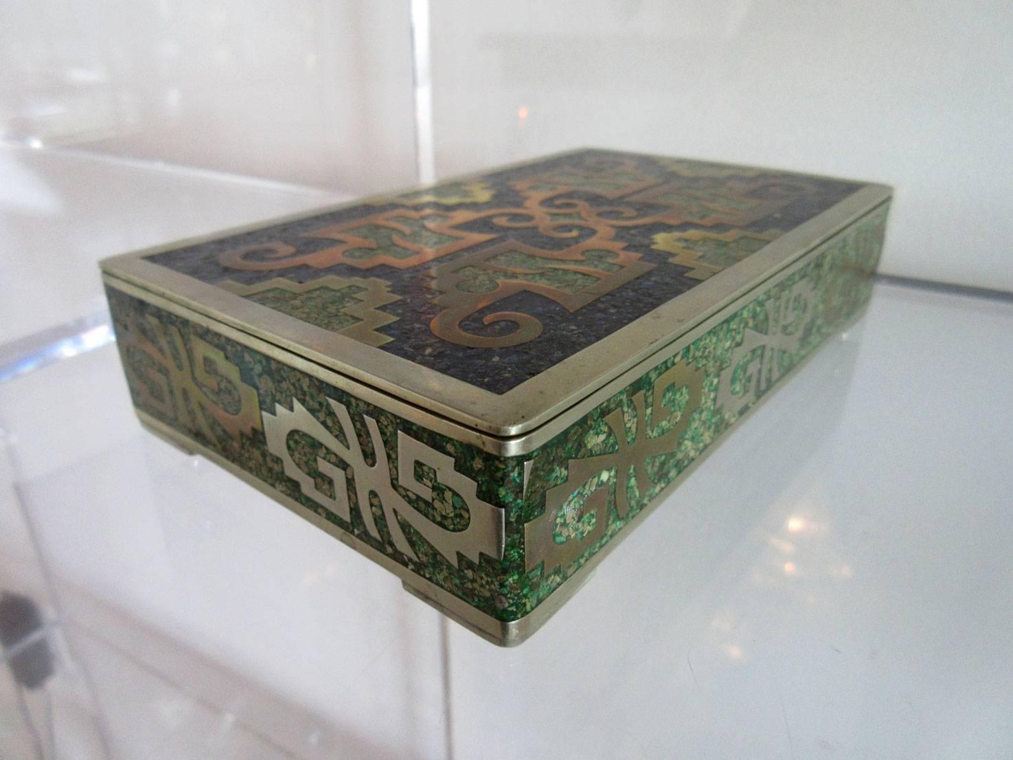 Vintage mixed metal Mexican box with wood interior. The box is inlaid with stone, making an ornate 