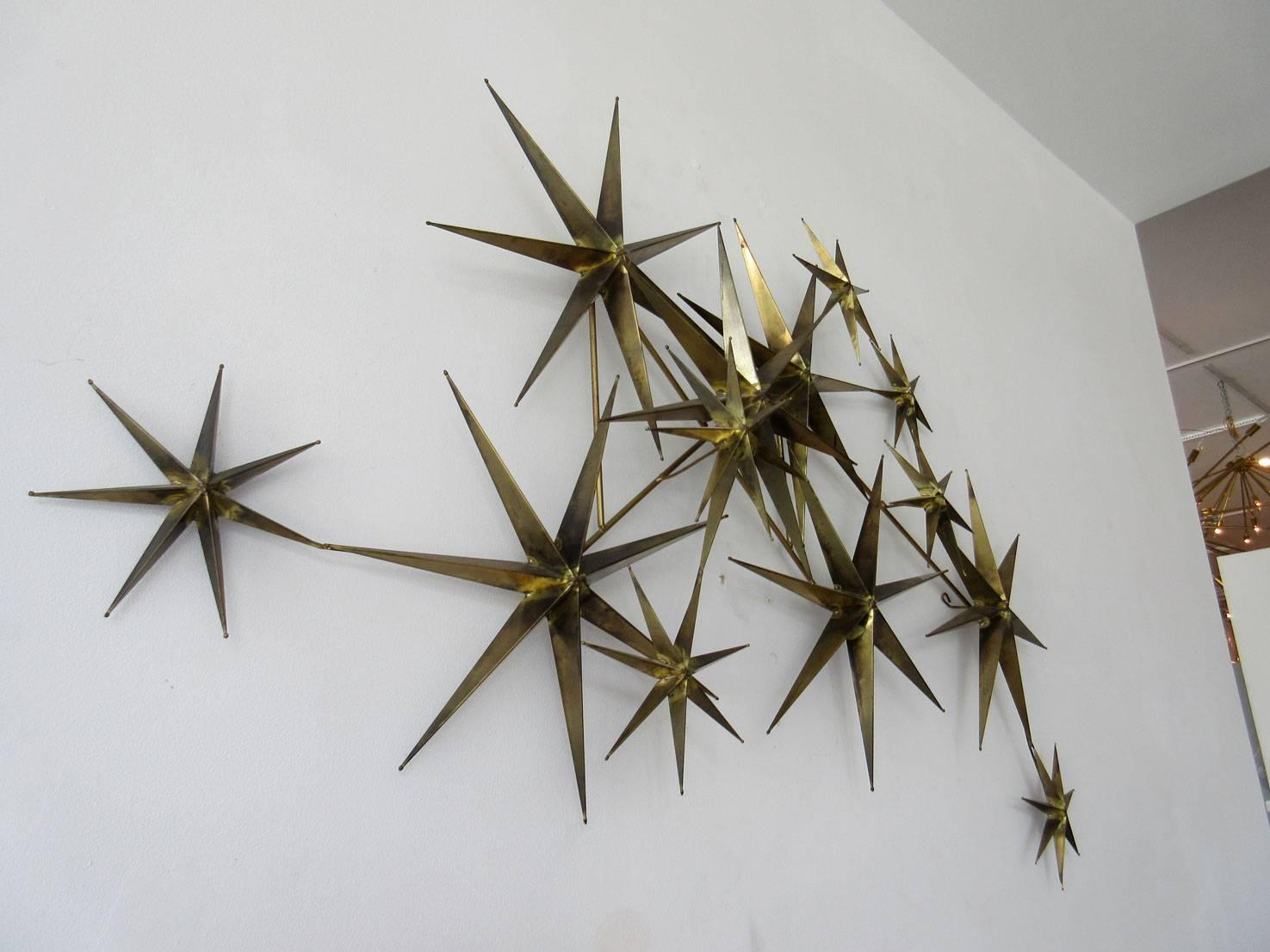 Unusual signed C. Jere wall sculpture, a series of dimensional starbursts. It is signed C. Jere 1981.
