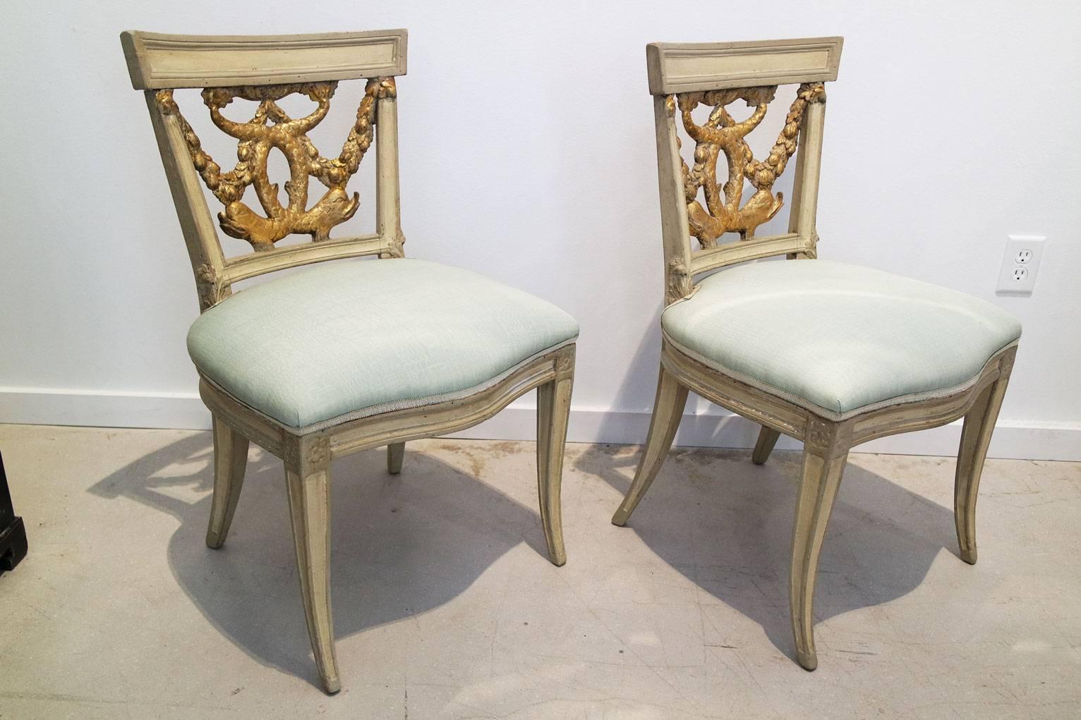 Carved Pair of Italian Neoclassical Painted and Partial Gilt Side Chairs
