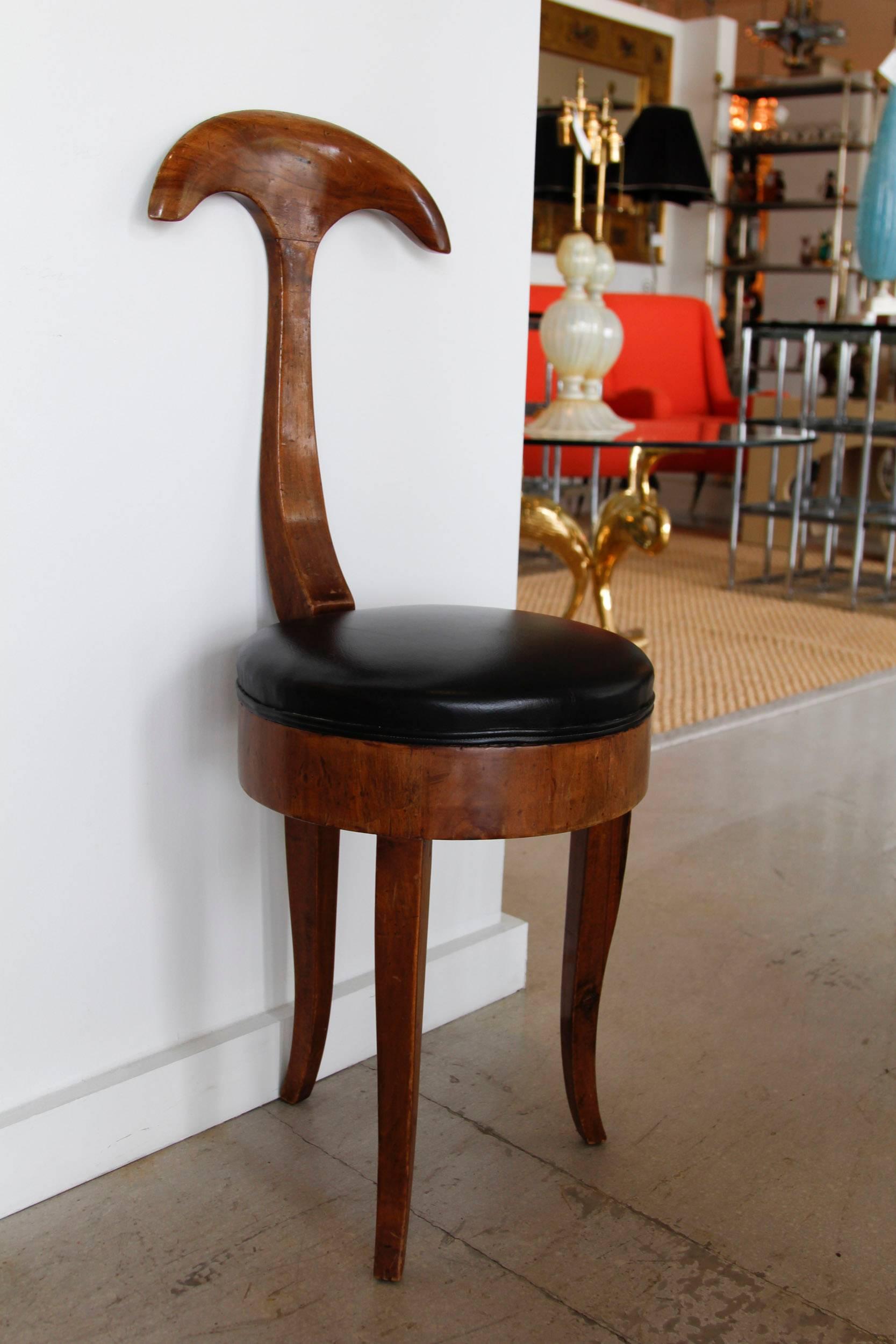 Whimsical Italian diminutive chair which may be placed in a multitude of vignettes.