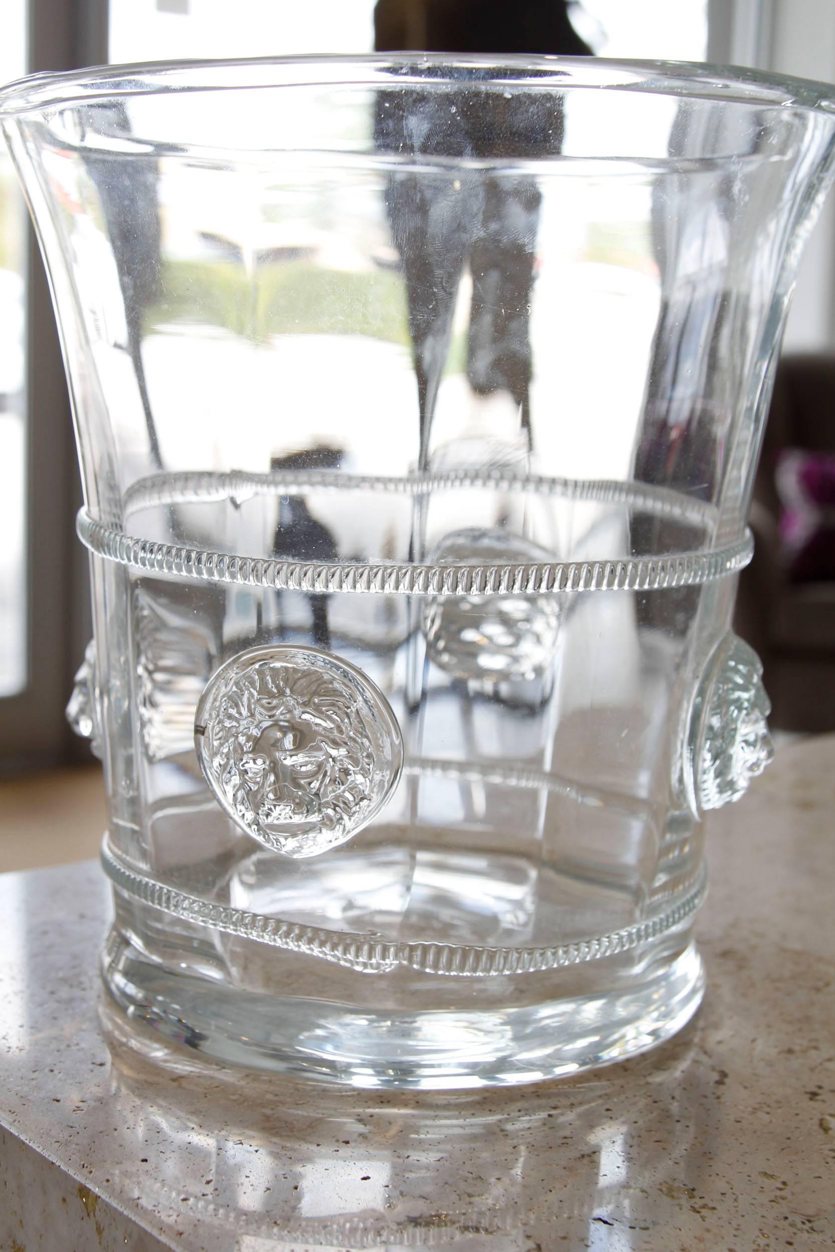 Elegant wine cooler with lion face motif. The piece may also be used as a vase.