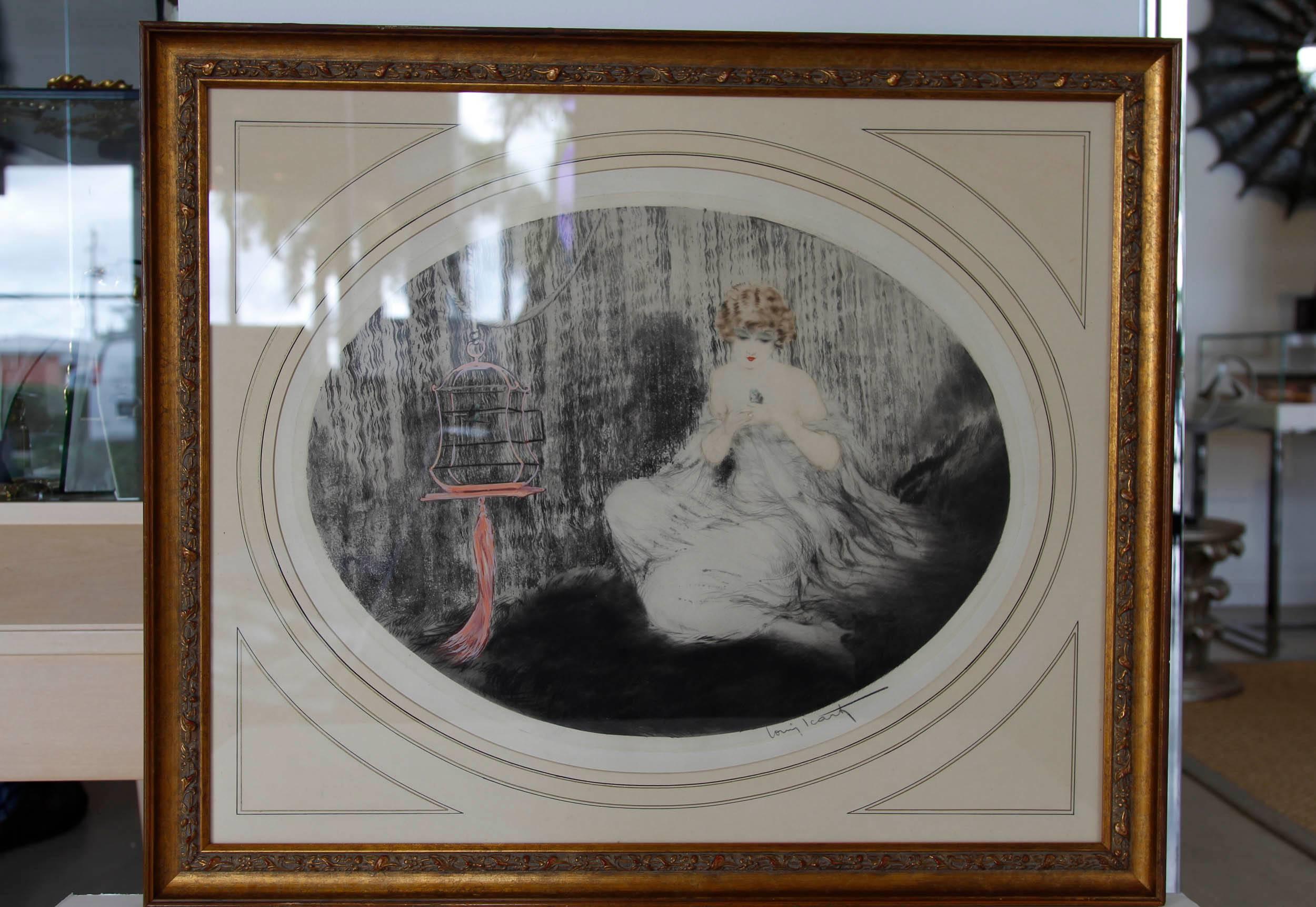 Original Louis Icart engraving depicting young woman with pink bird cage. 



Framed Engraving measures 22.5" H x 26.5" W 