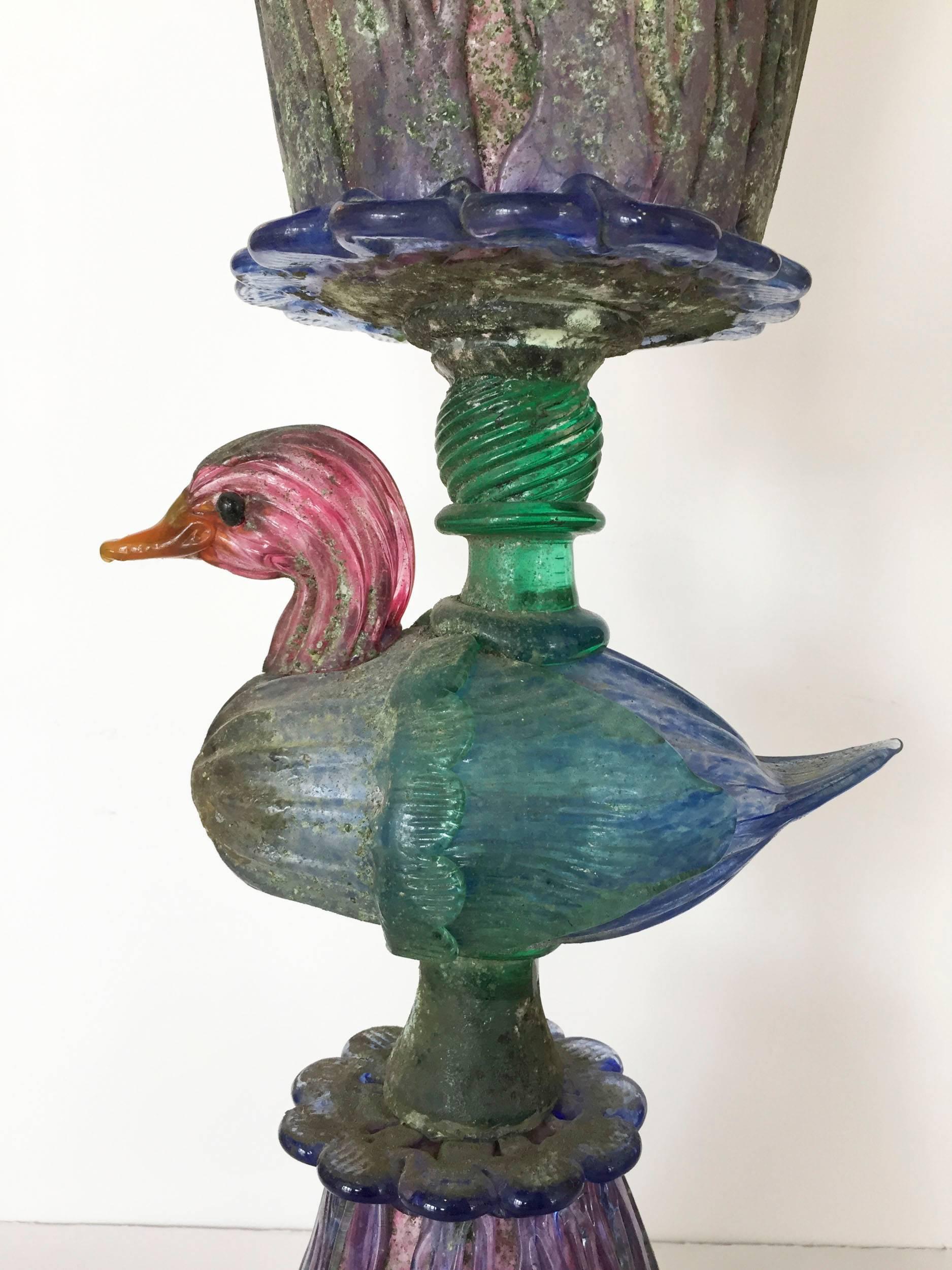 Stunning scavo glass centerpiece by master Murano glass blower Cenedese . In dramatic shades of lavender green pink and blue.