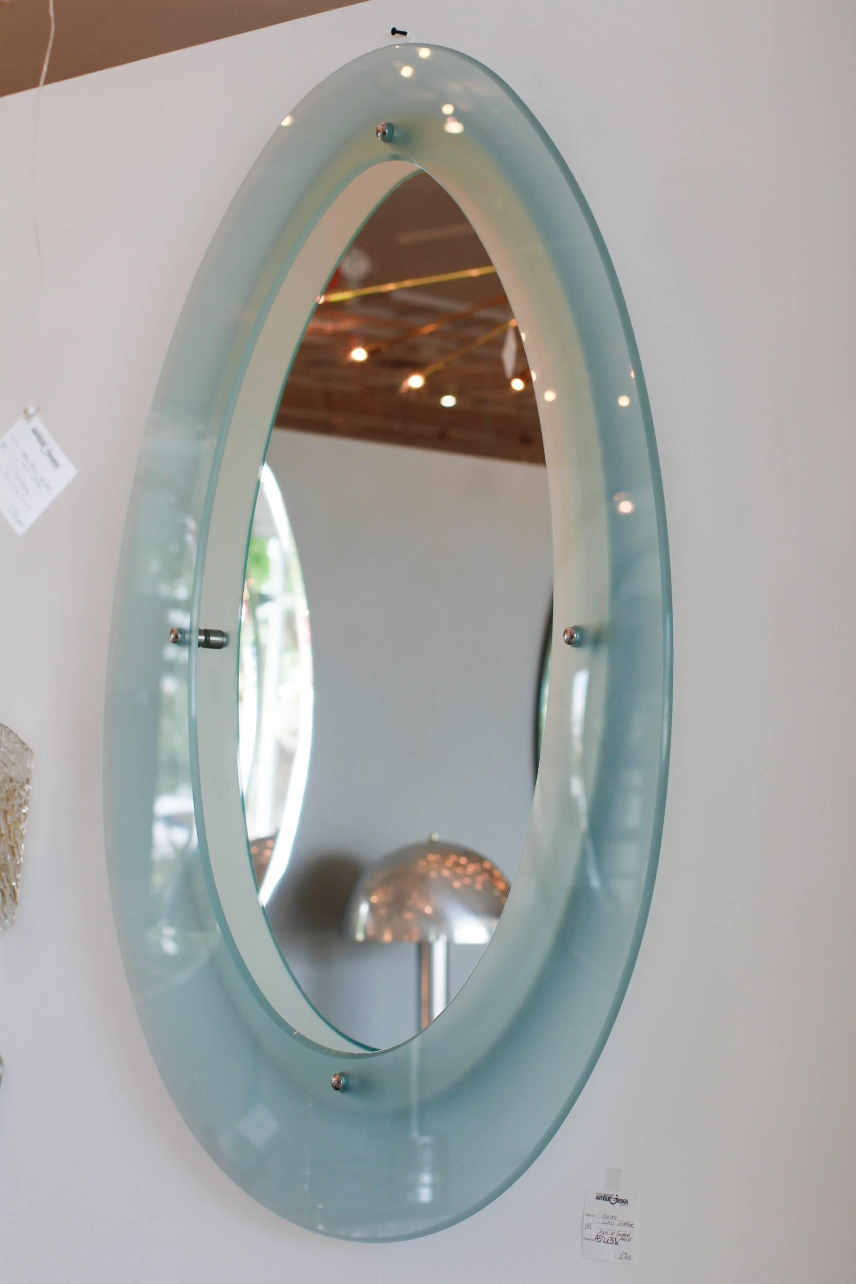 Green glass Italian mirror with chrome details.
