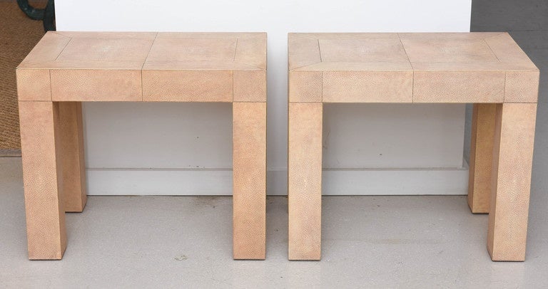Pair of stingray tables with pale blush tone.