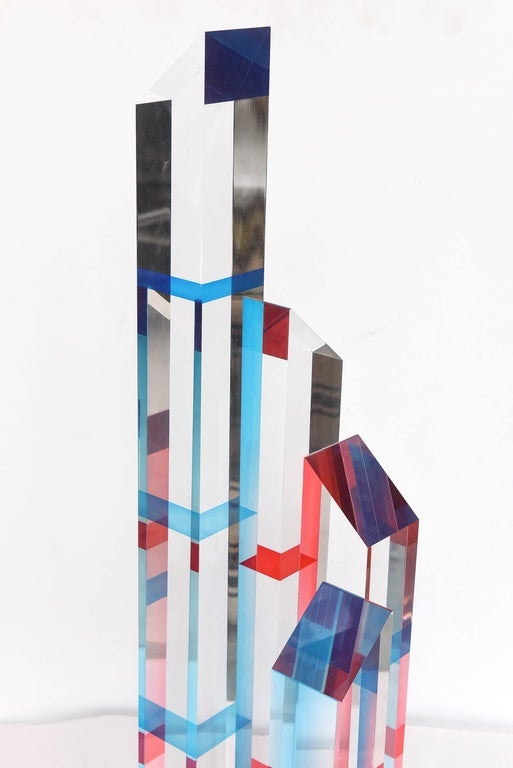 Lucite sculpture in the style of Vasa with bands of color, blue red and pink.