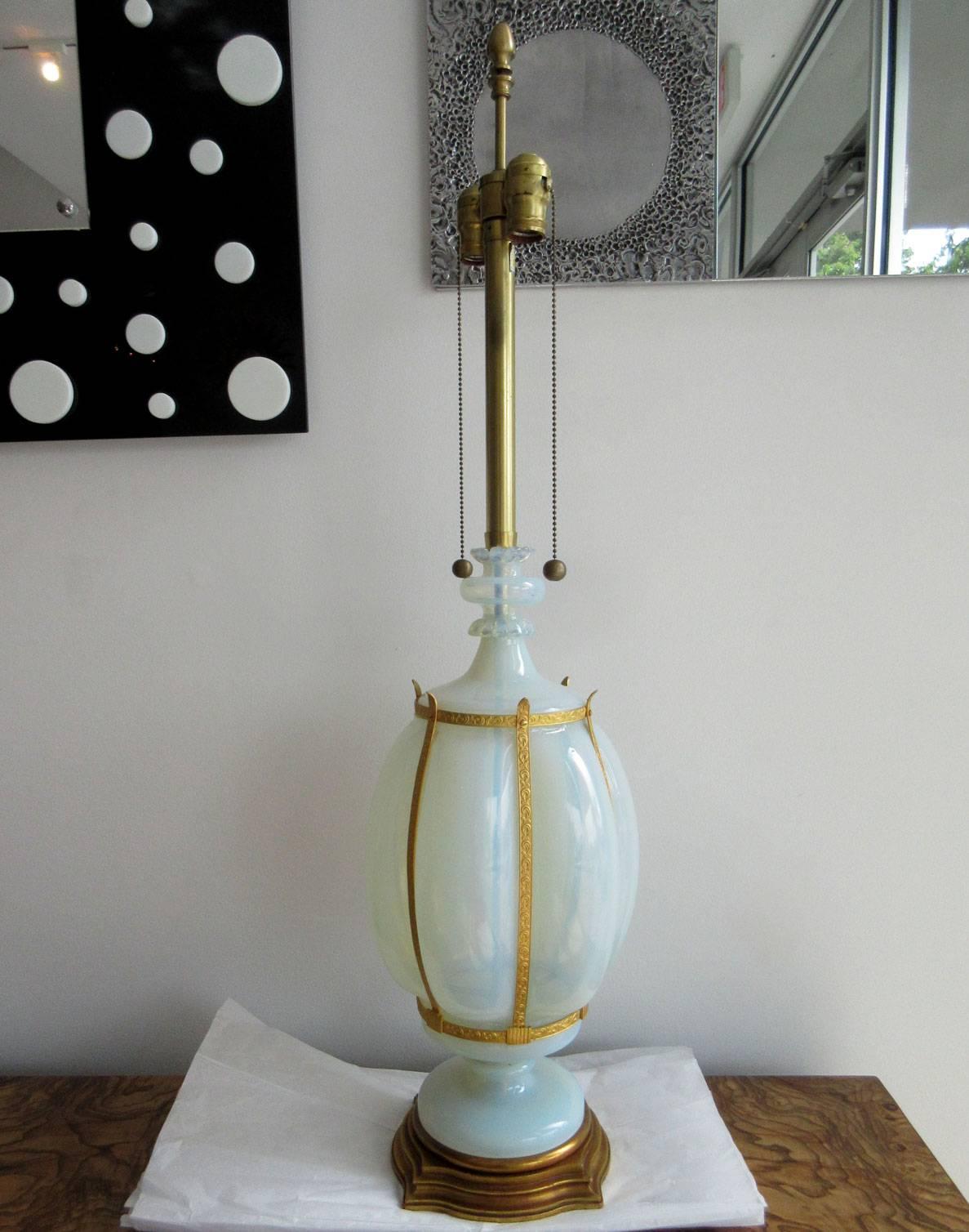 Pair of vintage Barovier handblown Murano glass lamps in an elegantly elongated gourd form with brass accents. The glass is opalescent sky-blue in color. Made for Marbro in the 1950s.

Note: one lamp has extensions on the pull chain that is not
