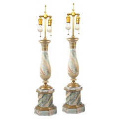 A pair of French Tole Oil Lamps