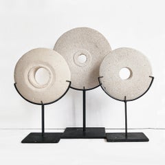 Three Hand-Carved Stone Bi disks on Stand, Indonesia, Organic Modern