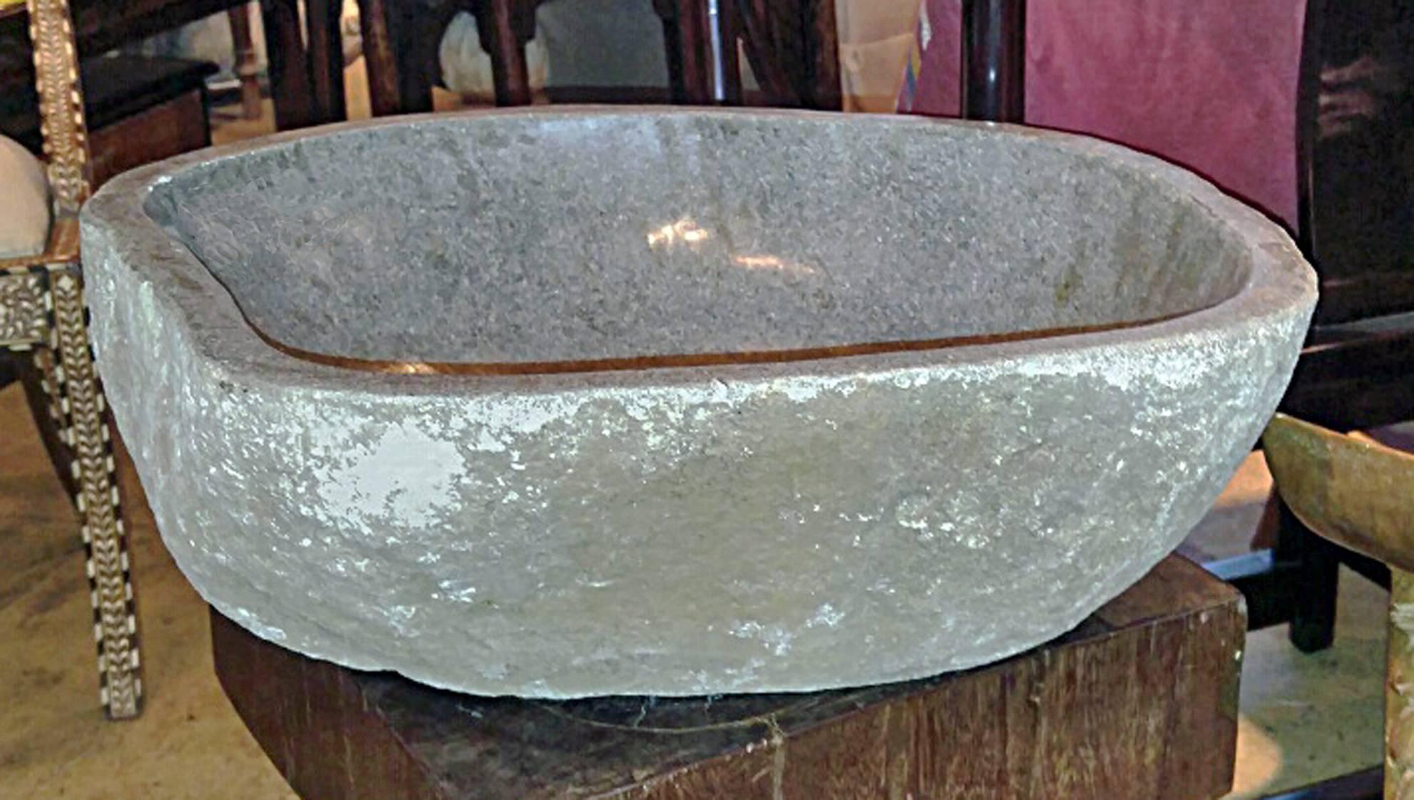 A stone bowl with a polished basin suitable for conversion as a wash basin on a stand. Can also be used as a decorative bowl or planter.