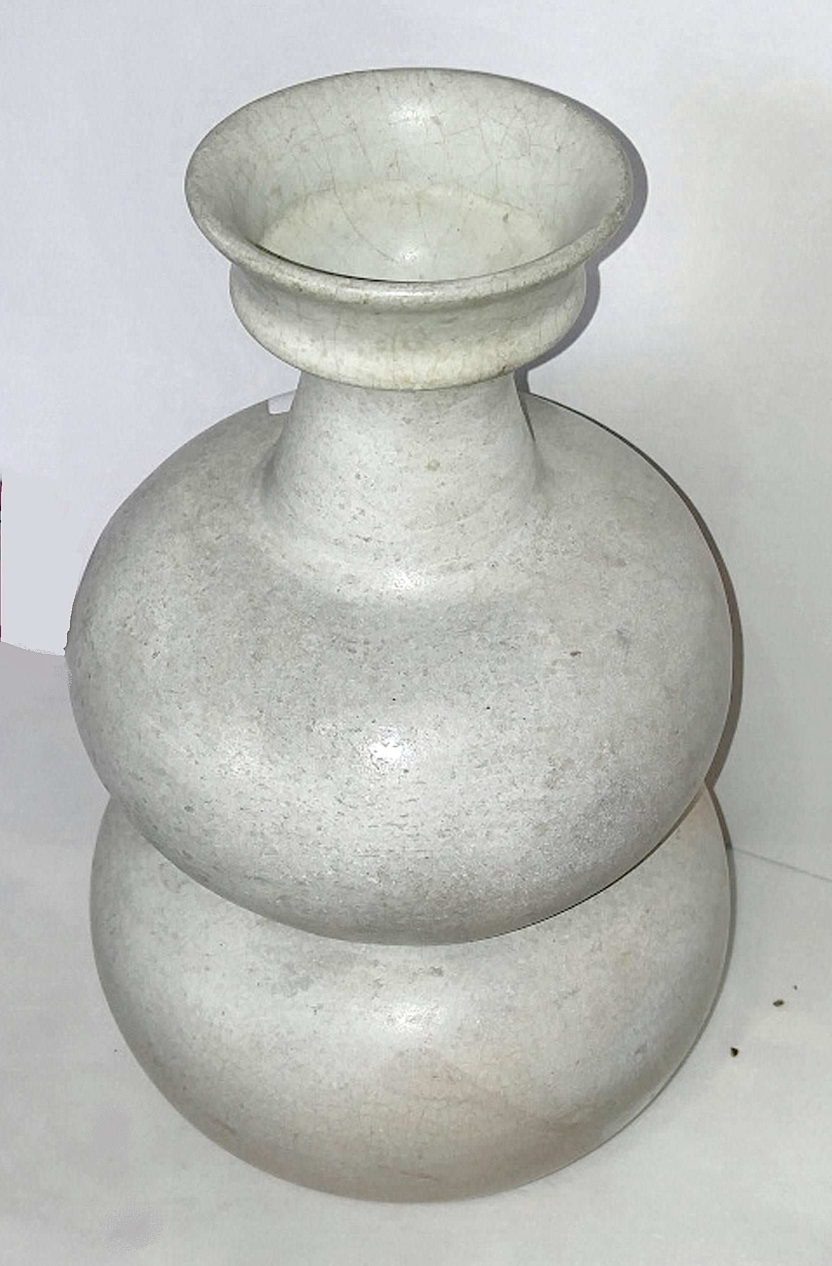 A ceramic vase with white glaze, from Thailand. Fluted neck, double round body, mid-20th century. Excellent vintage condition. Additional similar vases available. Priced separately.