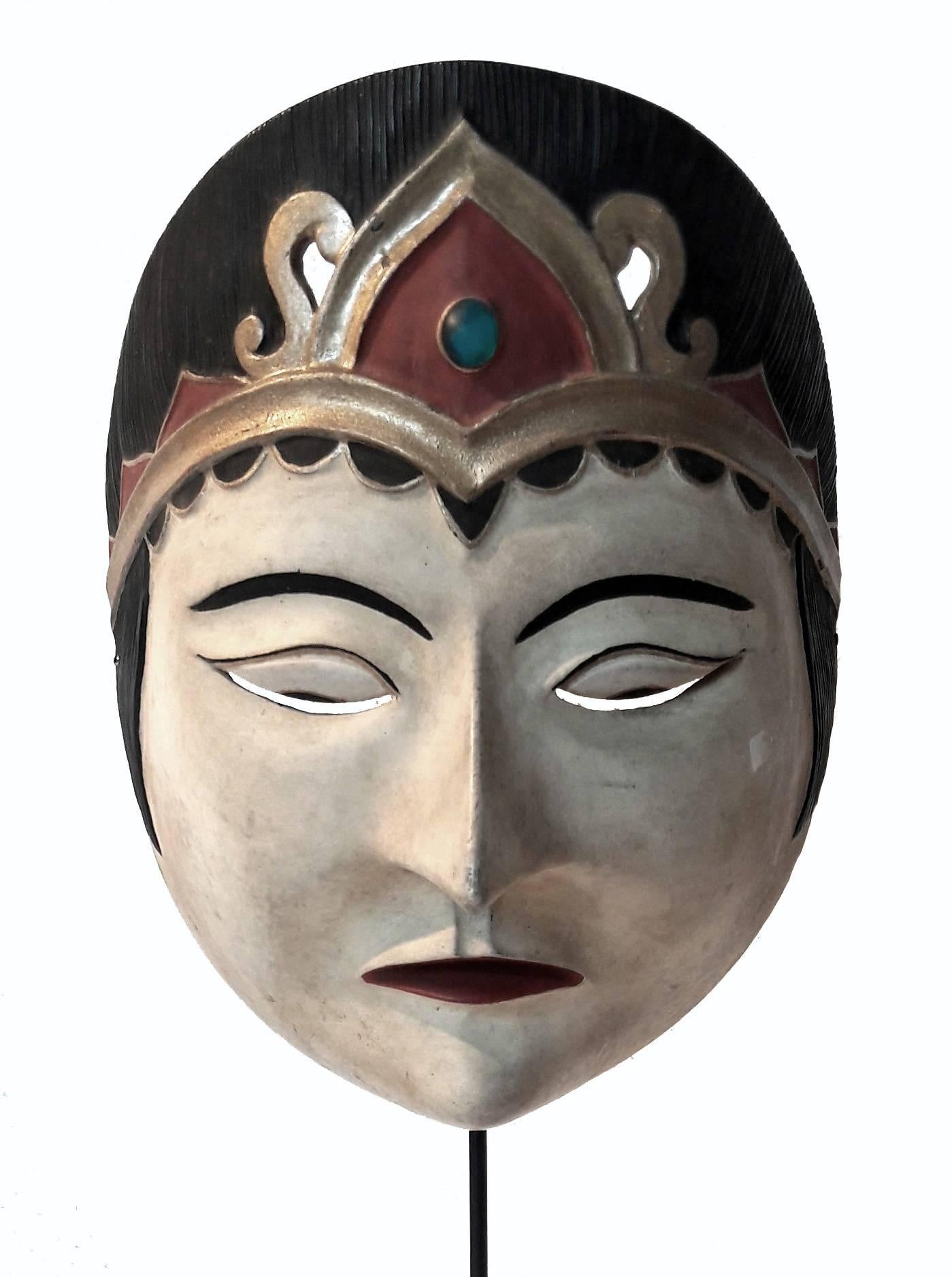 A selection of ceremonial masks from Indonesia. Styles, colors and sizes vary. Priced separately. Price of tallest mask shown below.

This masks are made of hand-carved wood and decorated with polychrome paints. They represent diverse characters